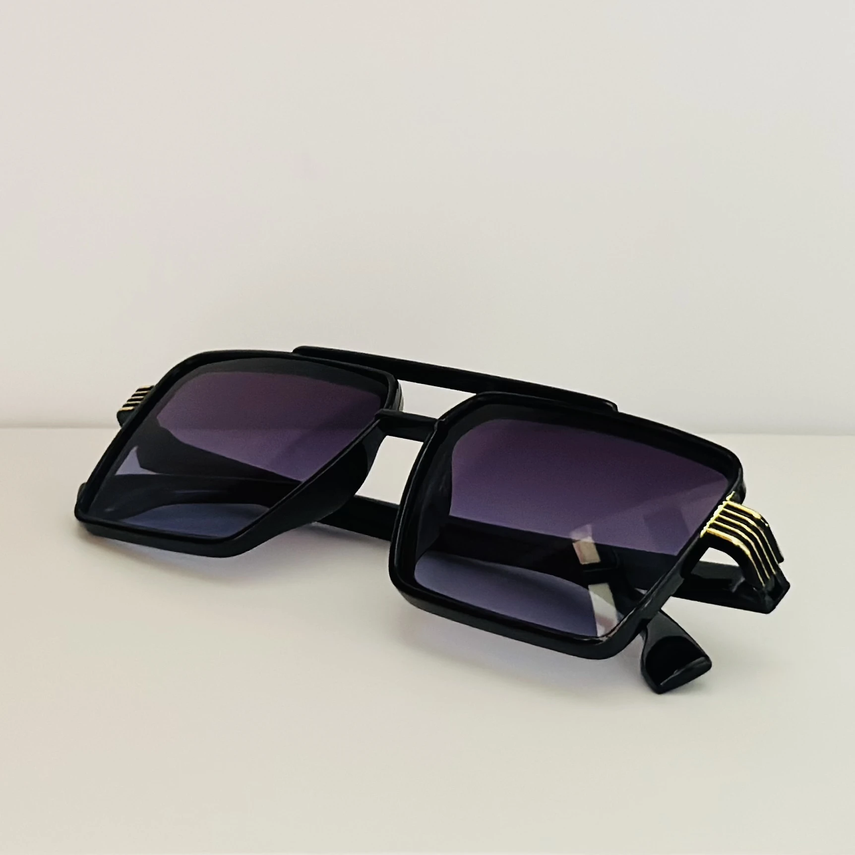 square sunglasses with a black frame