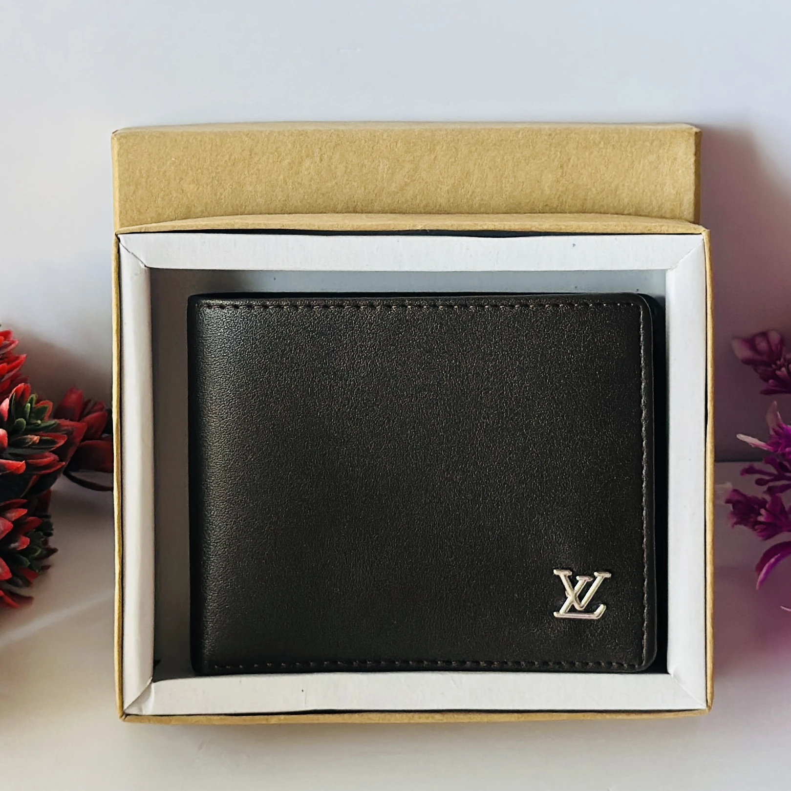 Louis Vuitton Multiple Wallet in black leather.