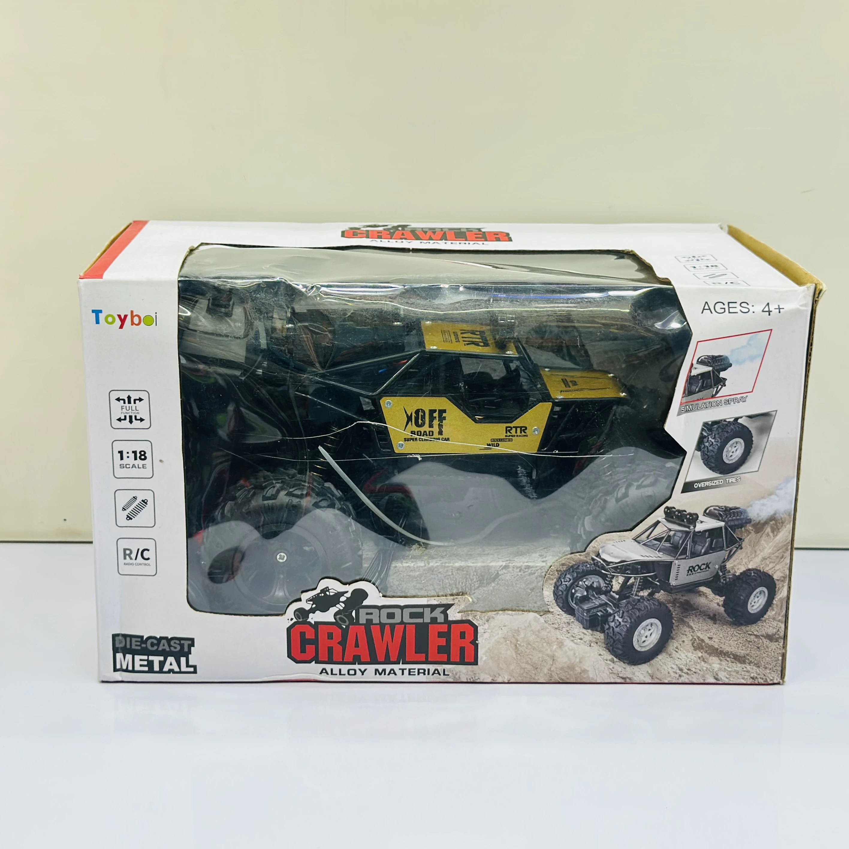 Toyboi 1:18 scale R/C die-cast metal rock crawler toy.