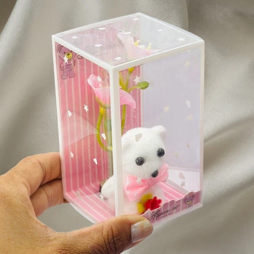 White teddy bear and artificial flower gift set