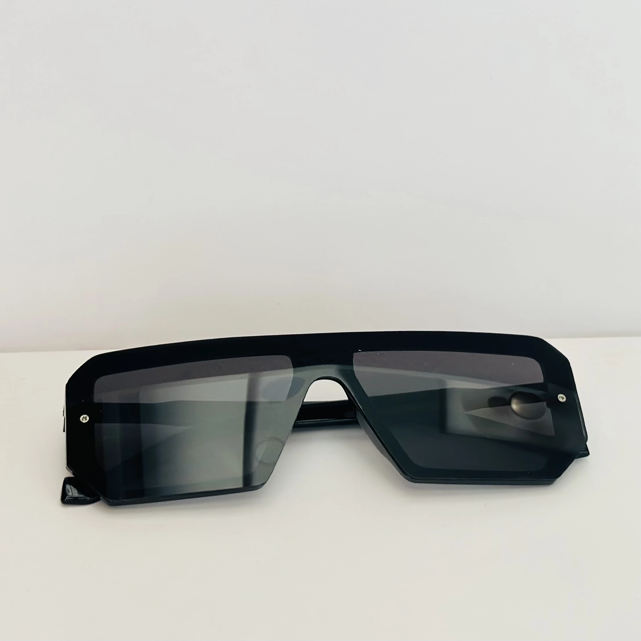 black oversized square flat top sunglasses with a visor design.