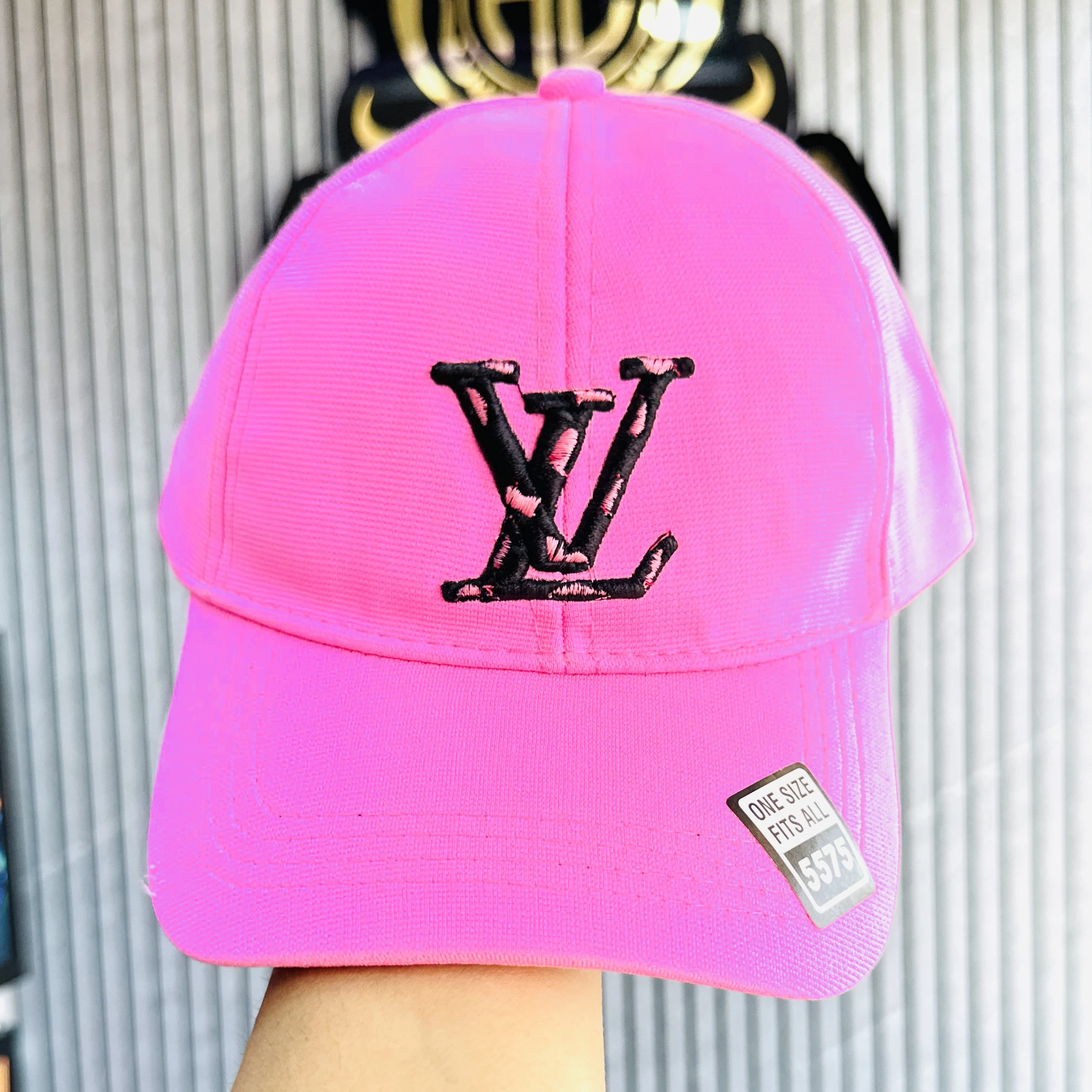 Louis Vuitton LV Signature cap in a pink cotton material.