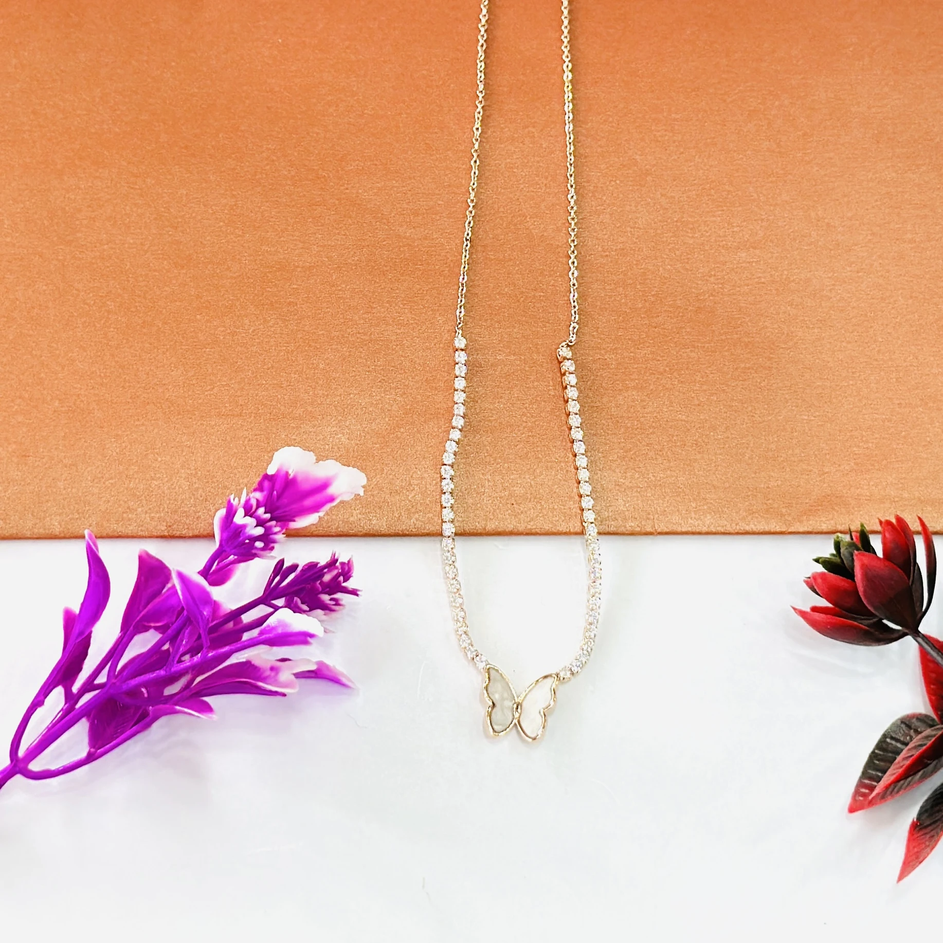 Gold tone butterfly pendant