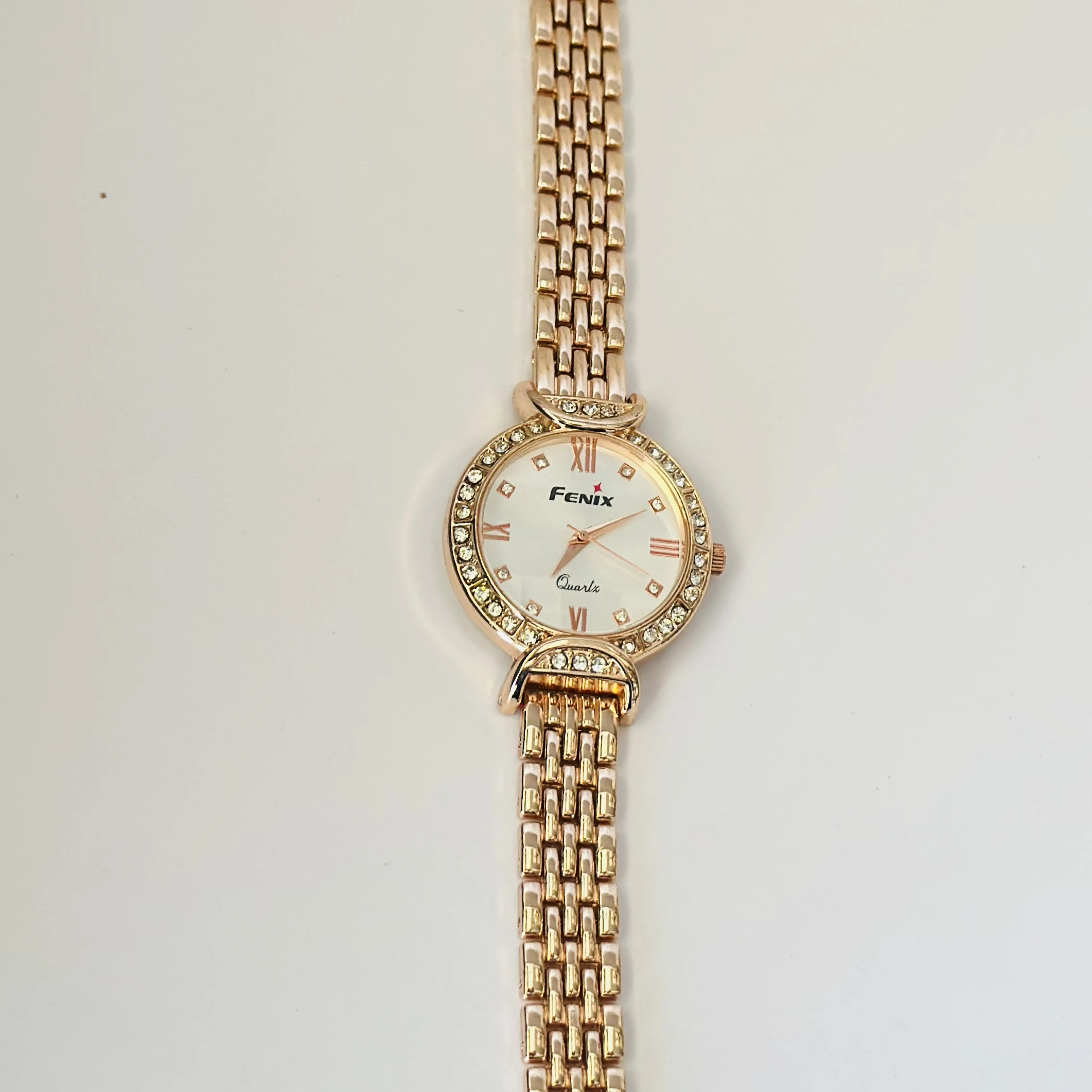Women’s rose gold-tone quartz watch
