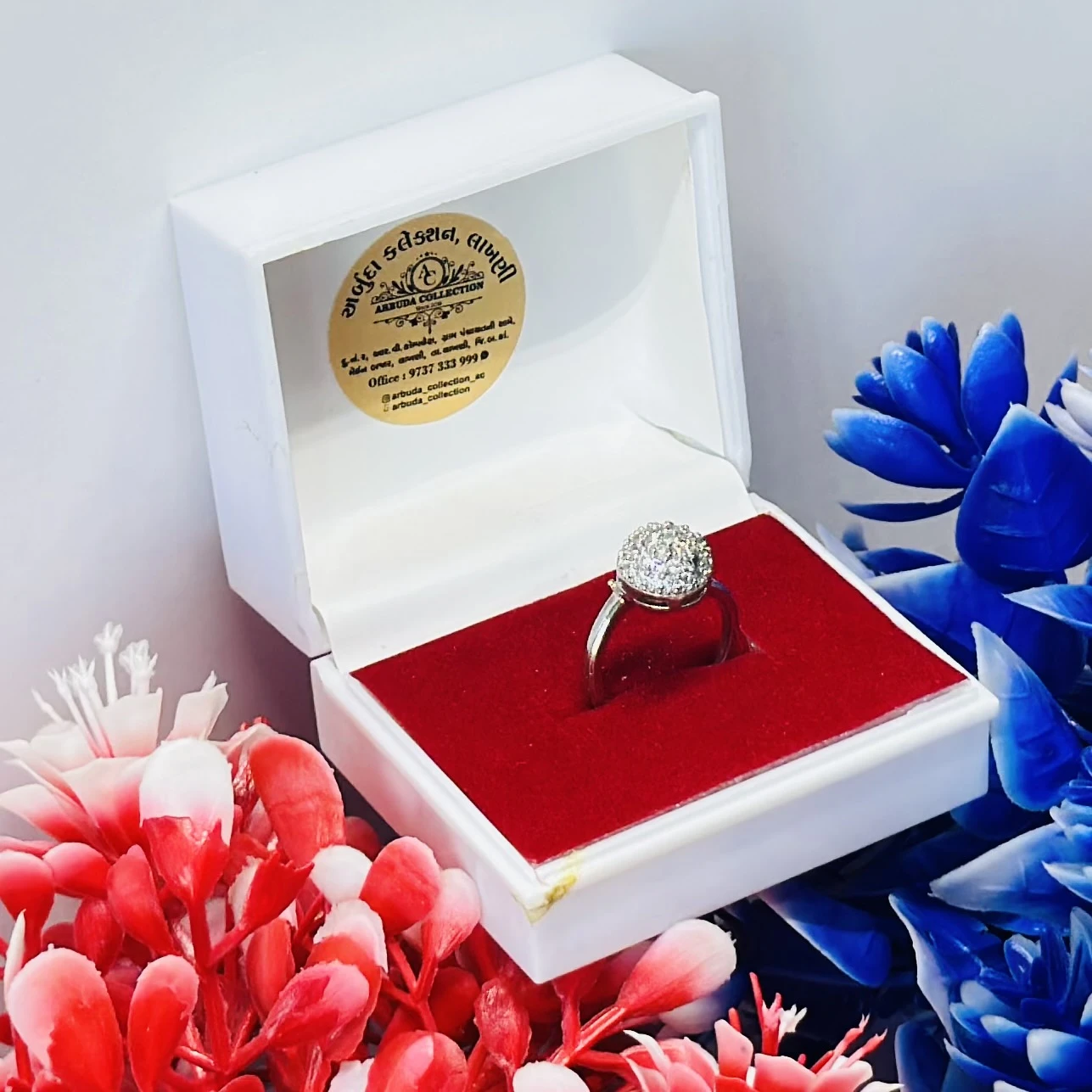 Abdesigns silver-plated American diamond cocktail ring.