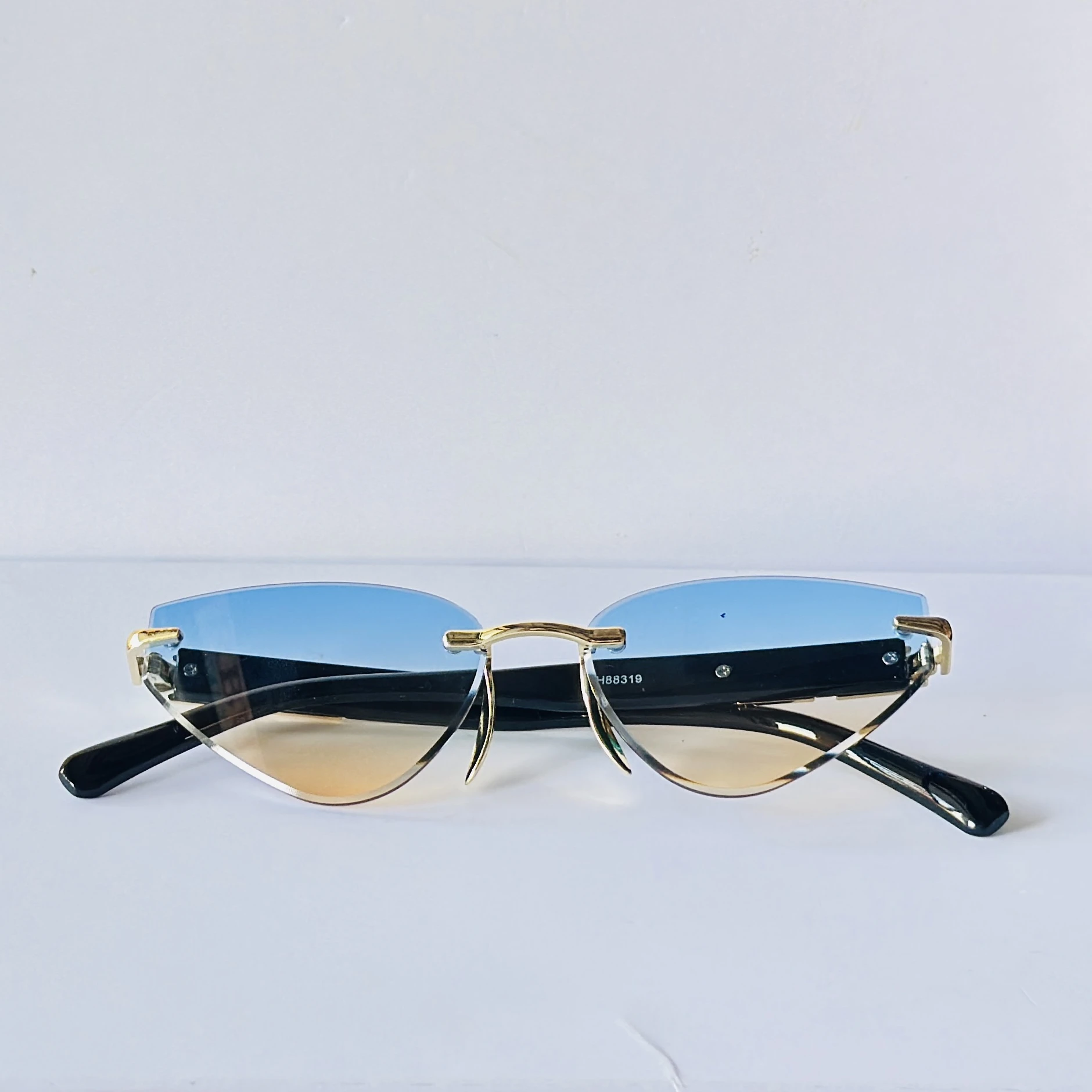 Rimless cat-eye sunglasses