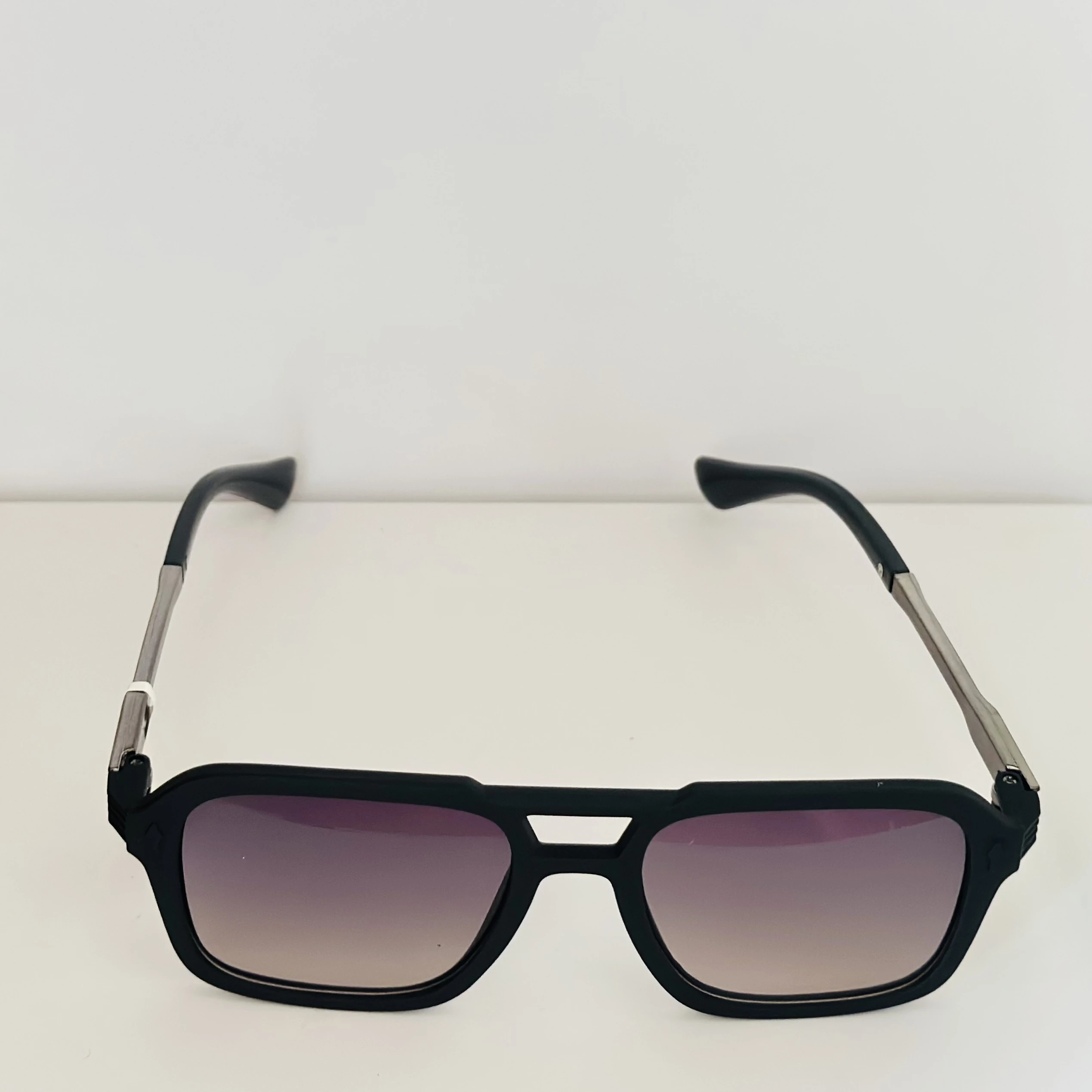 black Carrera 317/S navigator sunglasses with grey gradient lenses.