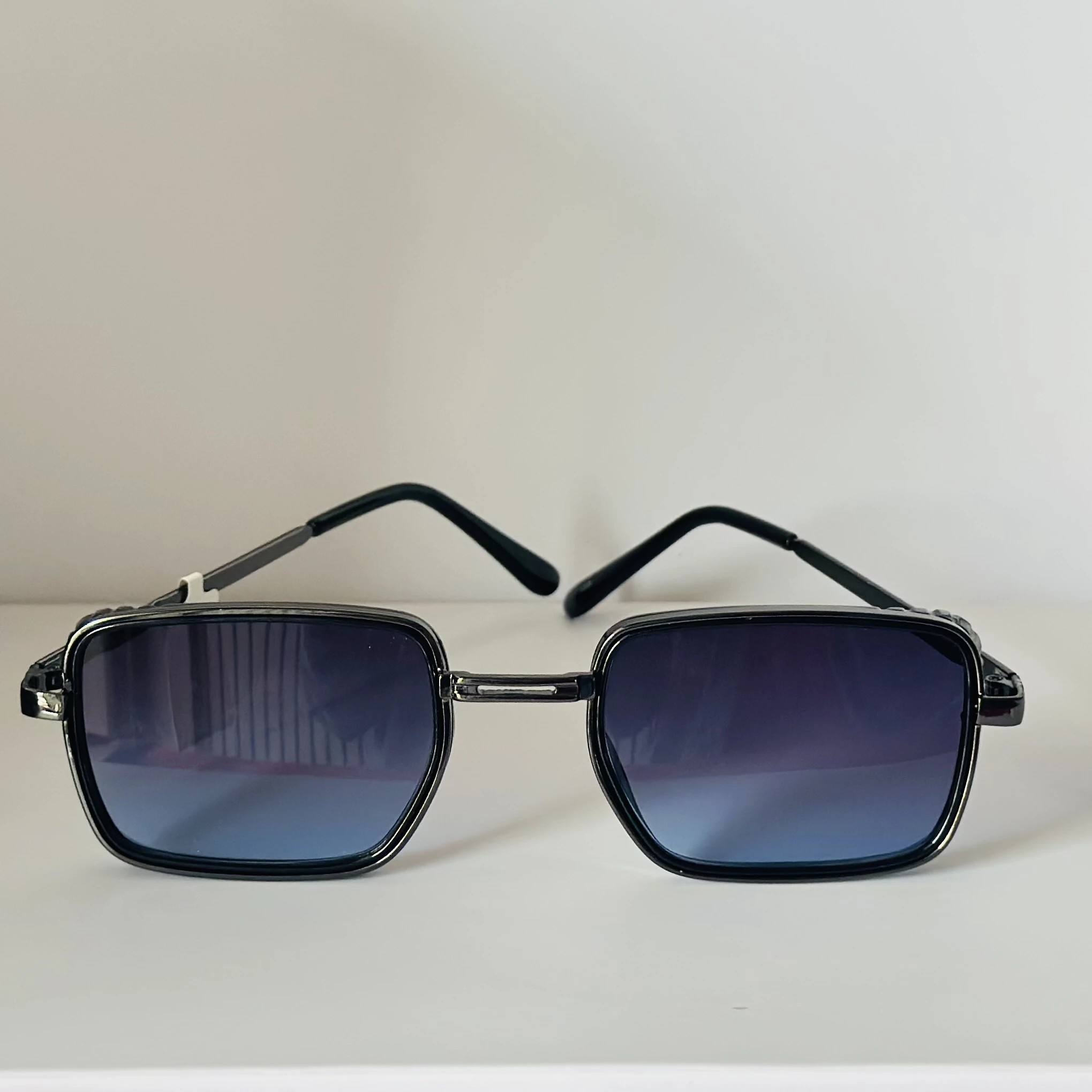 pair of Aedoll Goggle sunglasses with a gold metal frame and pink gradient lenses.