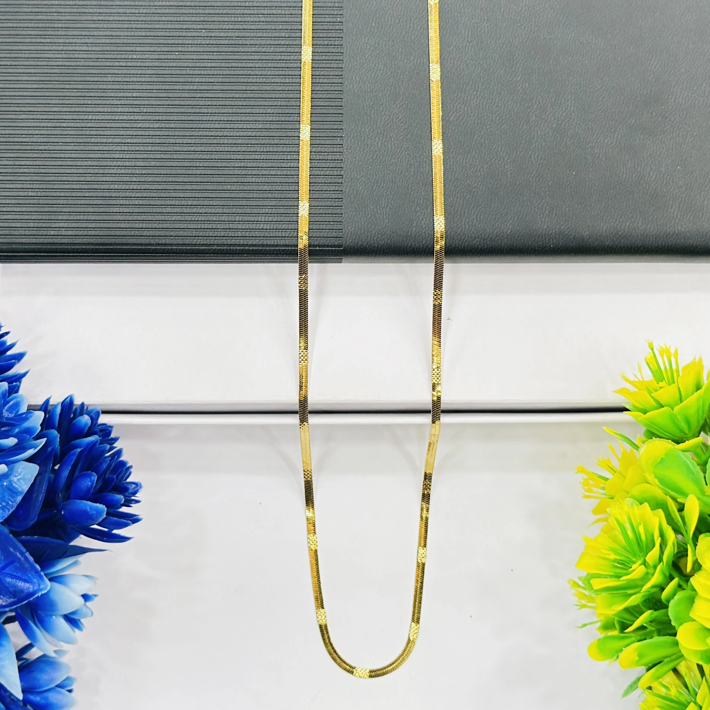 premium gold-plated herringbone snake chain.