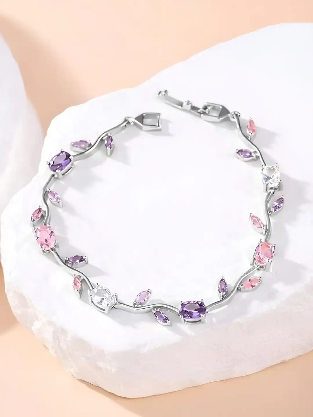 Style Kraft bracelet features a silver-plated design adorned with multi-colored tulip-shaped gems