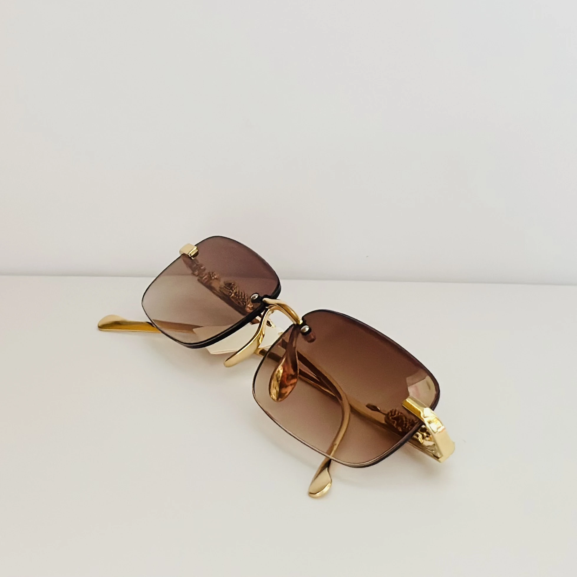 Rimless rectangular sunglasses