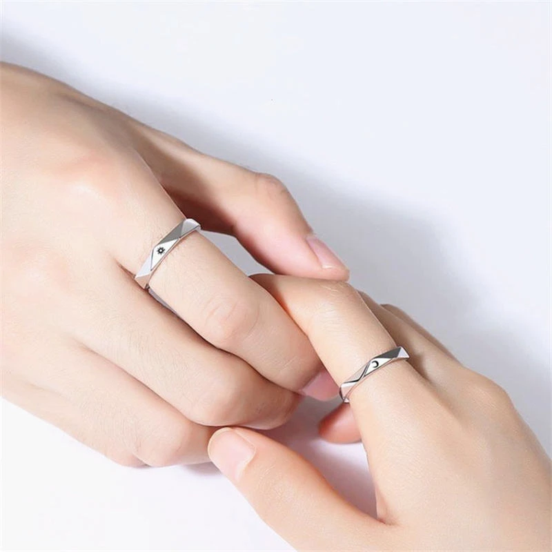 Set of silver-toned couple rings