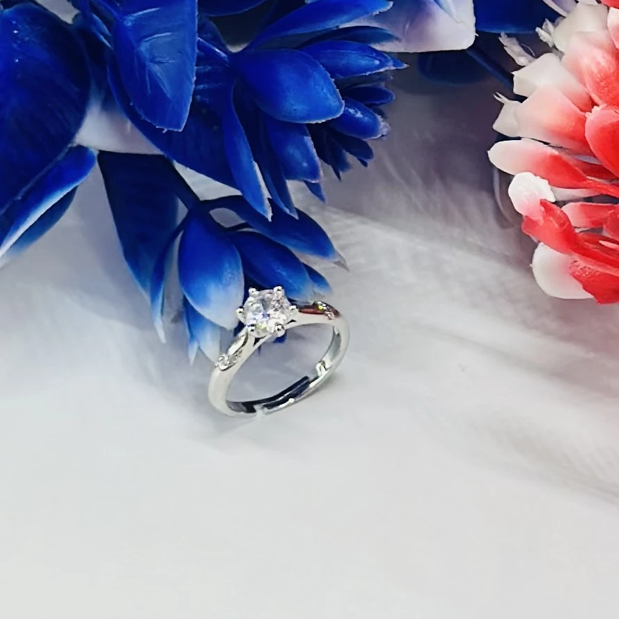 An adjustable silver-plated ring