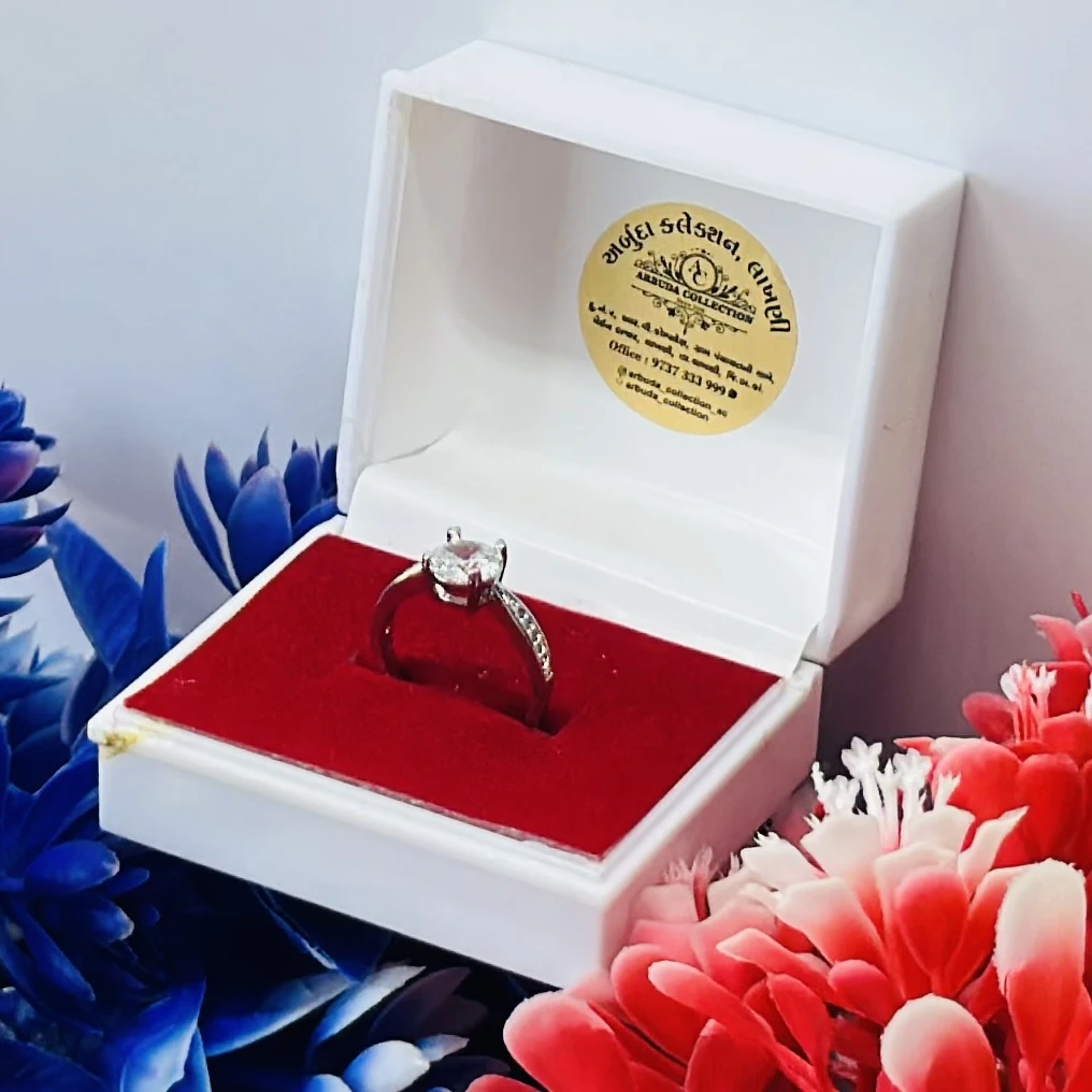 silver-toned adjustable ring with cubic zirconia stones.