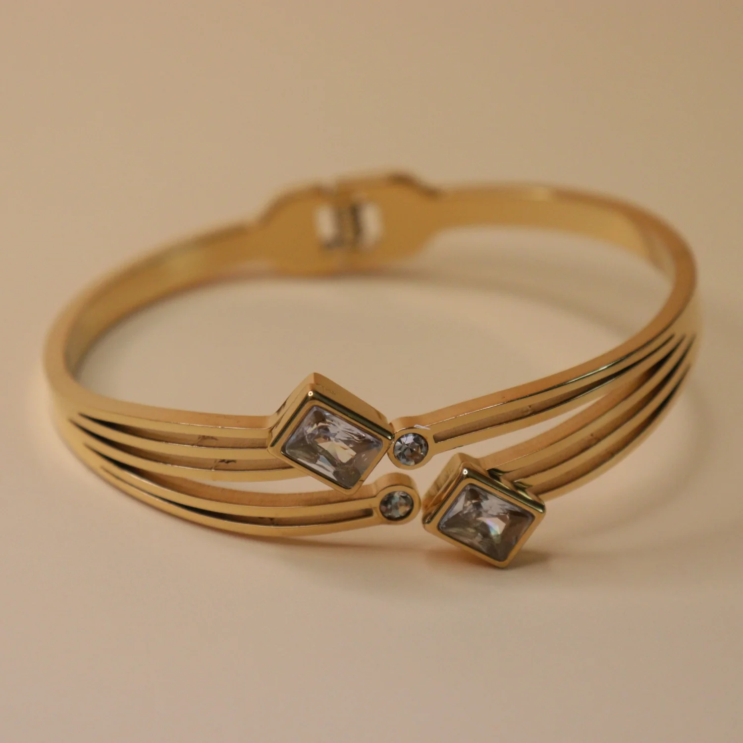 Gold toned multi-strand cuff bracelet