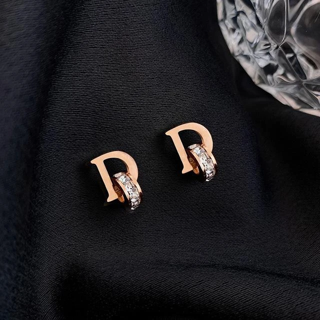 stainless steel CZ studded alphabetical letter "D" stud earrings.