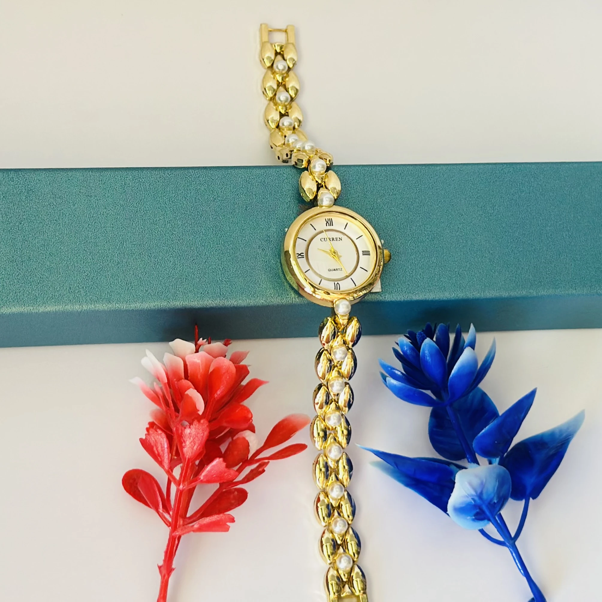 Gold tone women's bracelet watch