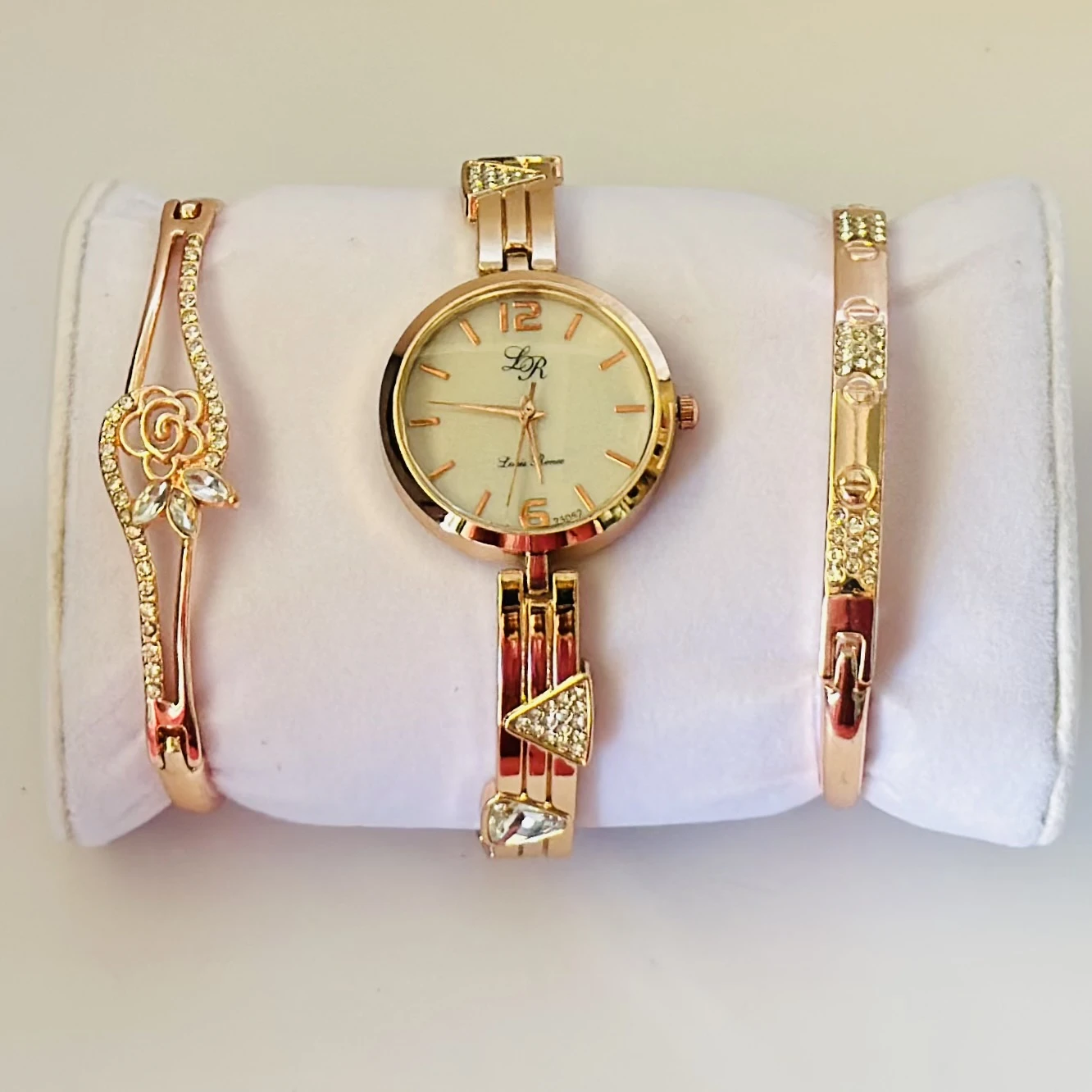 women's watch and bracelet set in rose gold color.