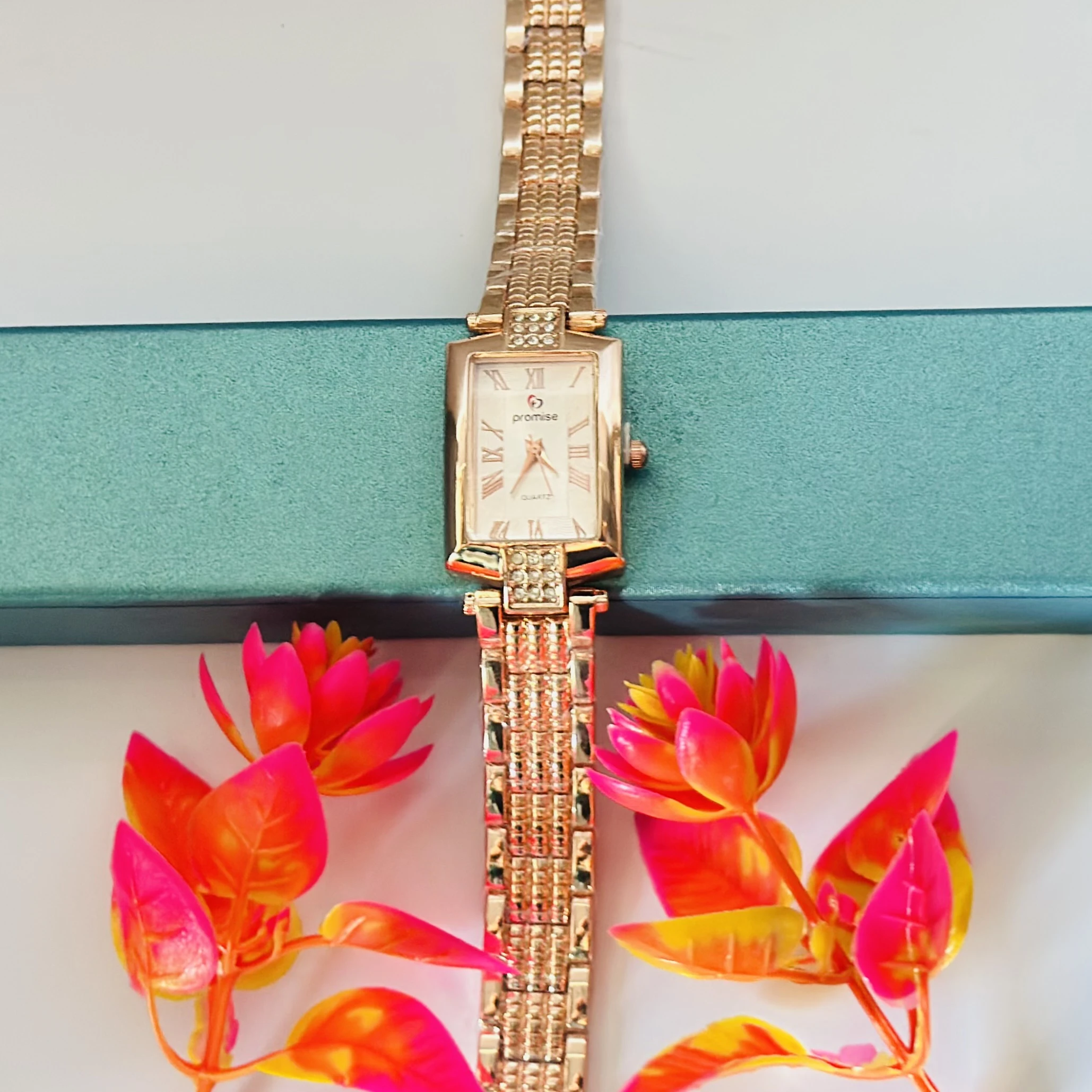 Rose gold analog watch