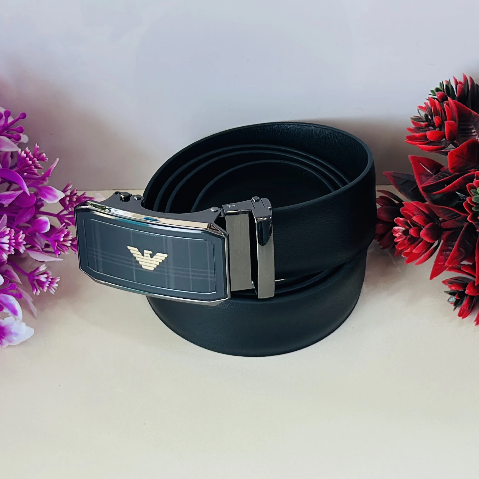 Emporio Armani black leather logo-buckle belt with a ratchet closure