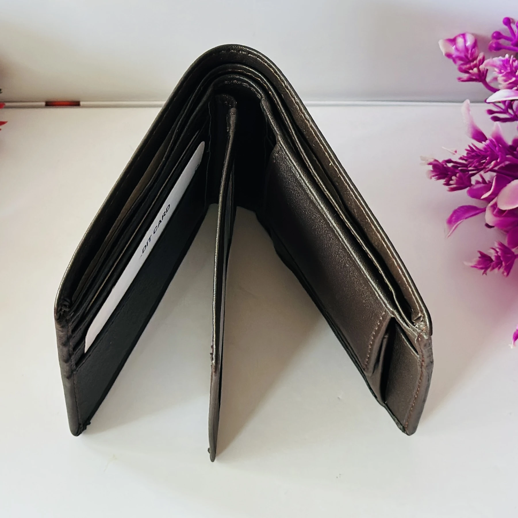 Louis Vuitton Multiple Wallet in black leather.
