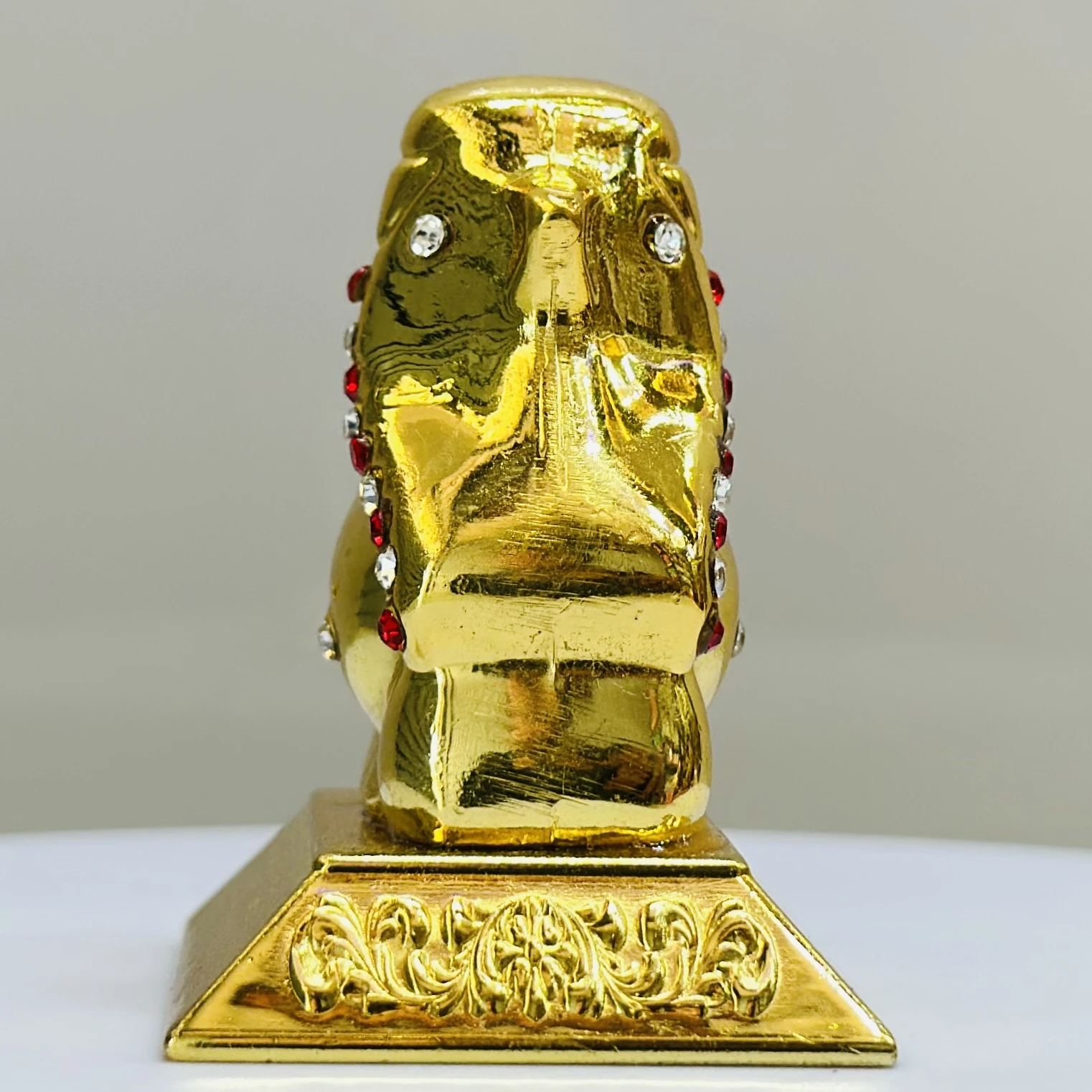 Gold colored idol of the Hindu deity Ganesha