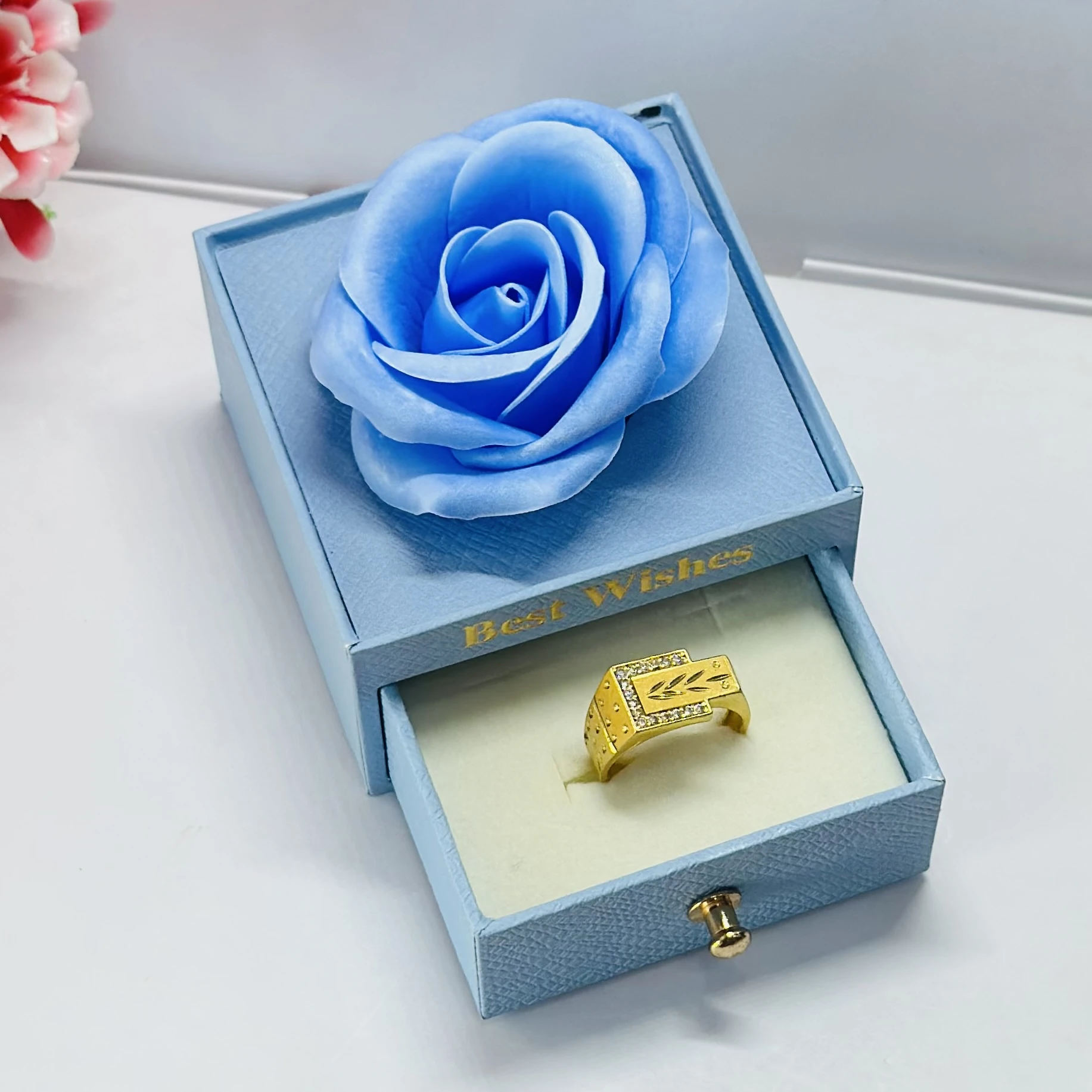 1 gram gold-plated men's ring with a rectangular face and side stone accents