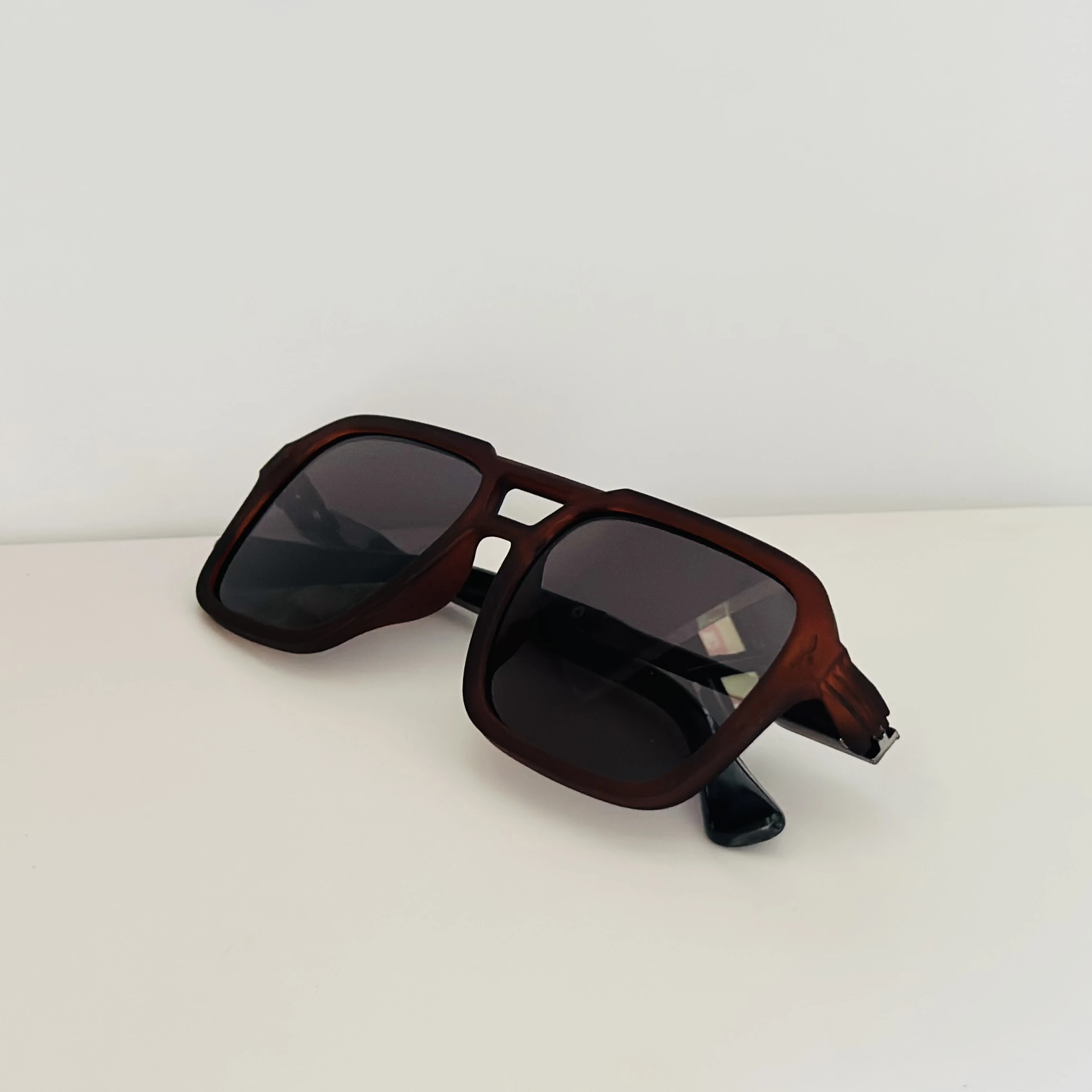 Cutler & Gross 1394 aviator sunglasses in a brown/cherry acetate frame.