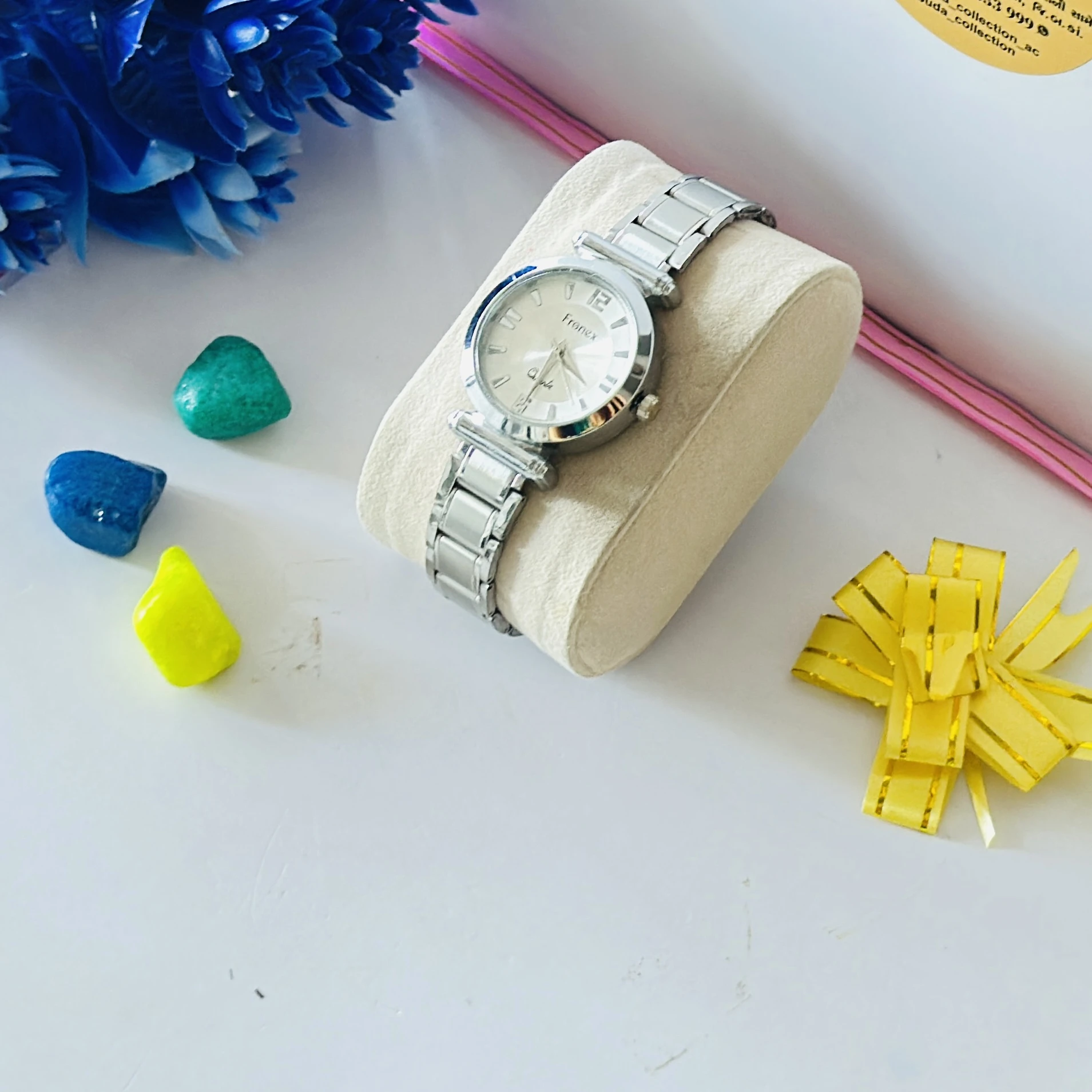silver-toned analog wristwatch