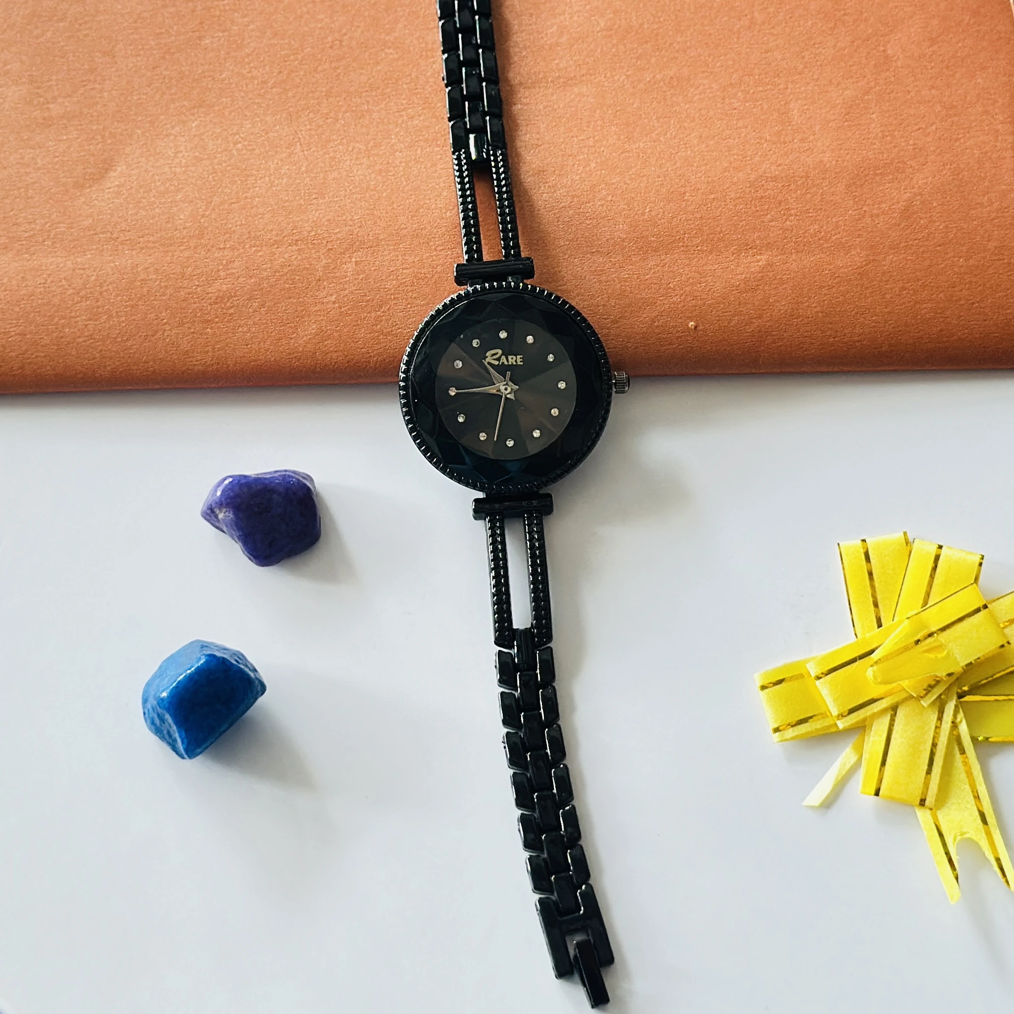 Black metal analog watch