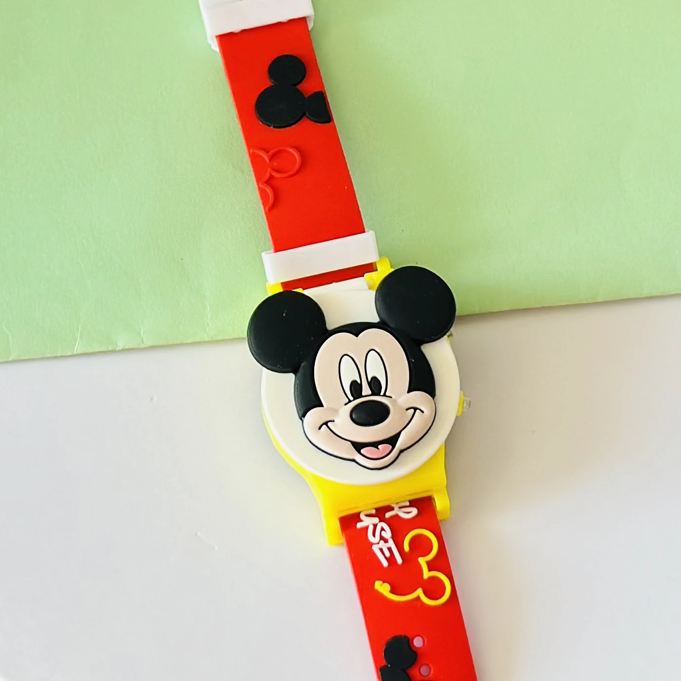 kids' Mickey Mouse character digital watch.