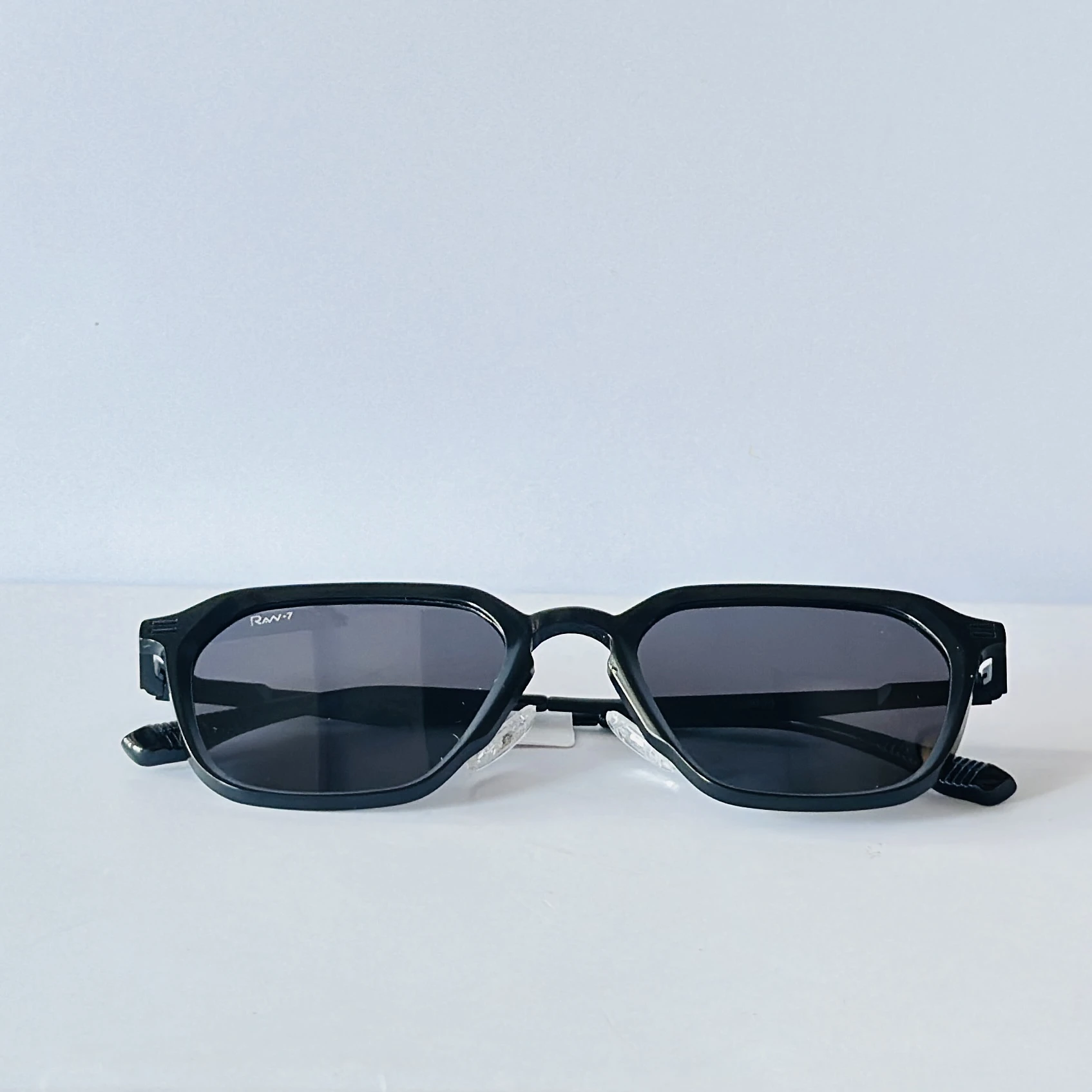 pair of black metal hexagonal sunglasses