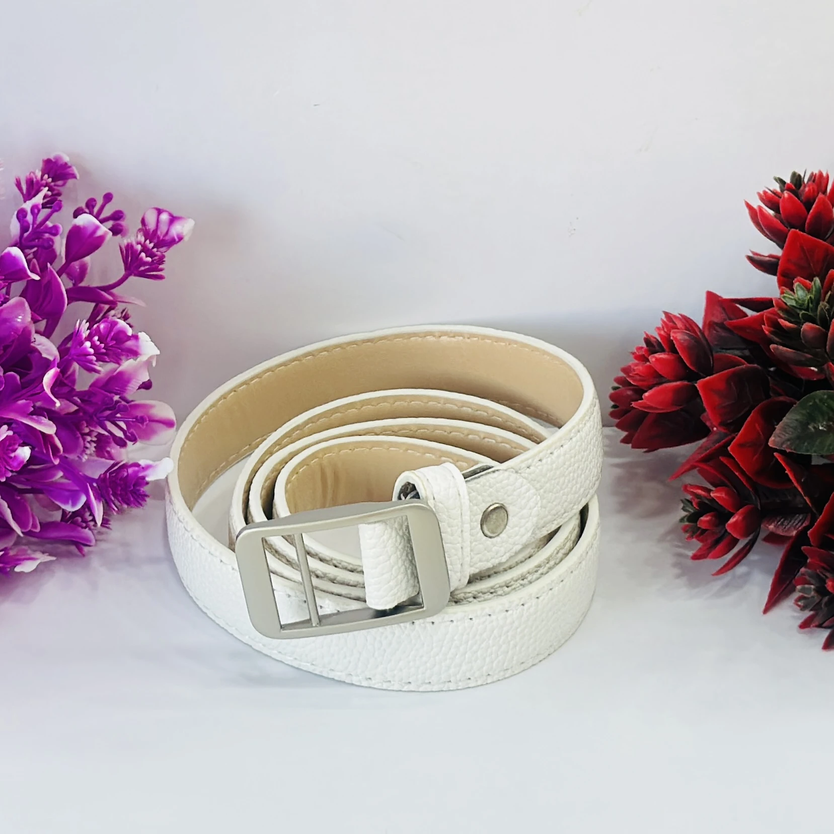 white artificial leather belt