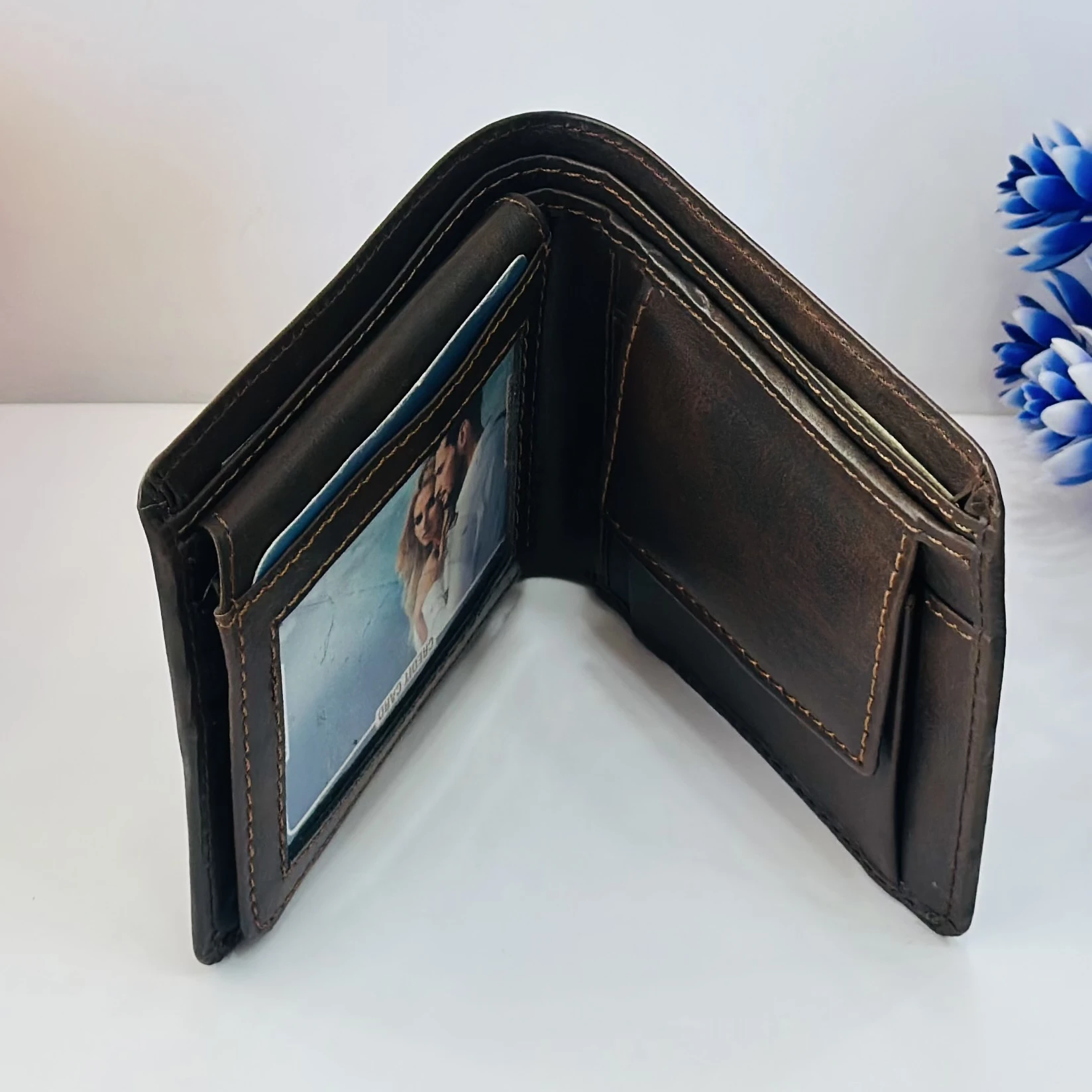 Alvis men's brown artificial leather bifold wallet.