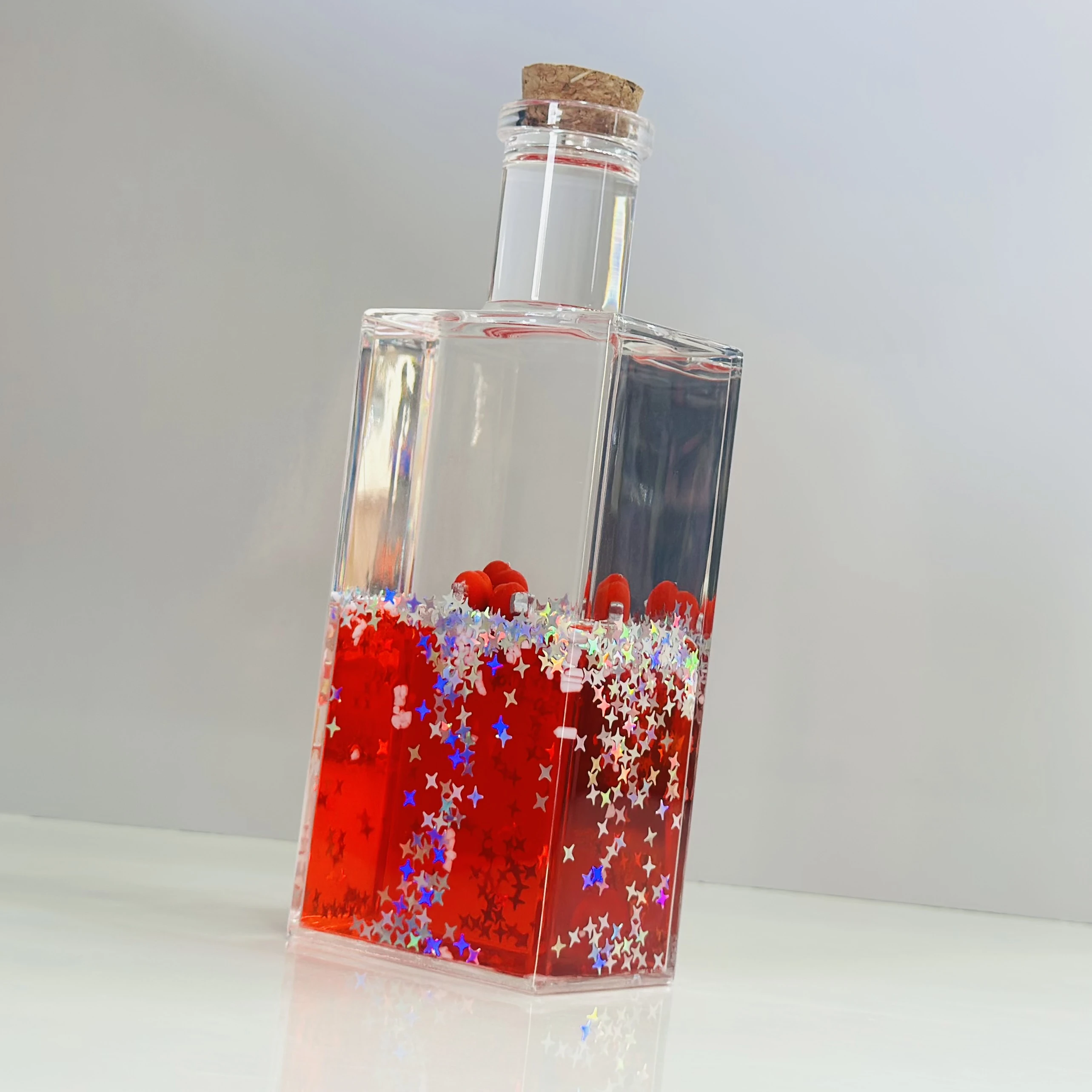 decorative fluid bottle with hearts and stars. (SKU-S4IER4)