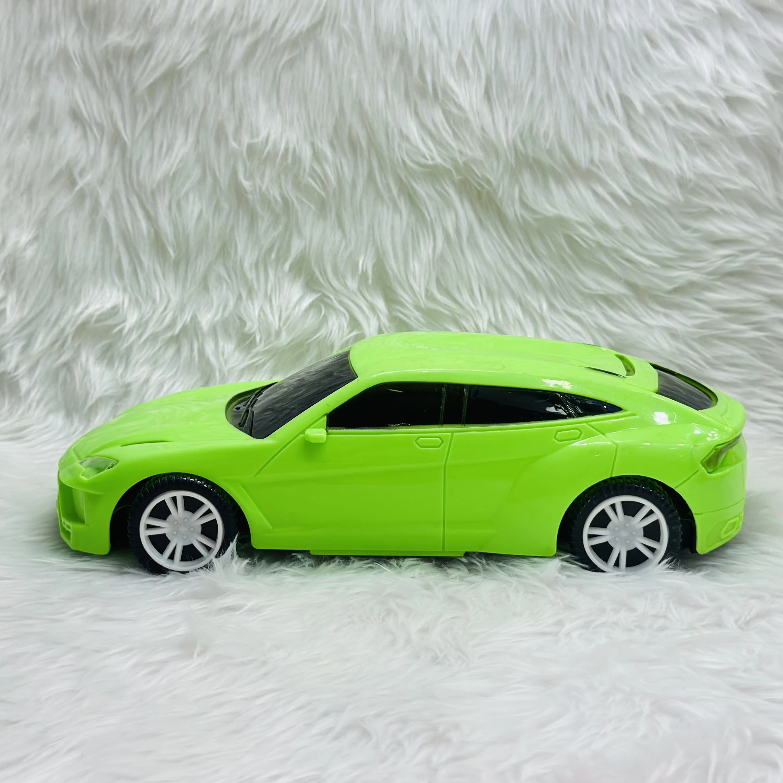 Green toy car, which is a model of a Lamborghini Urus SUV.