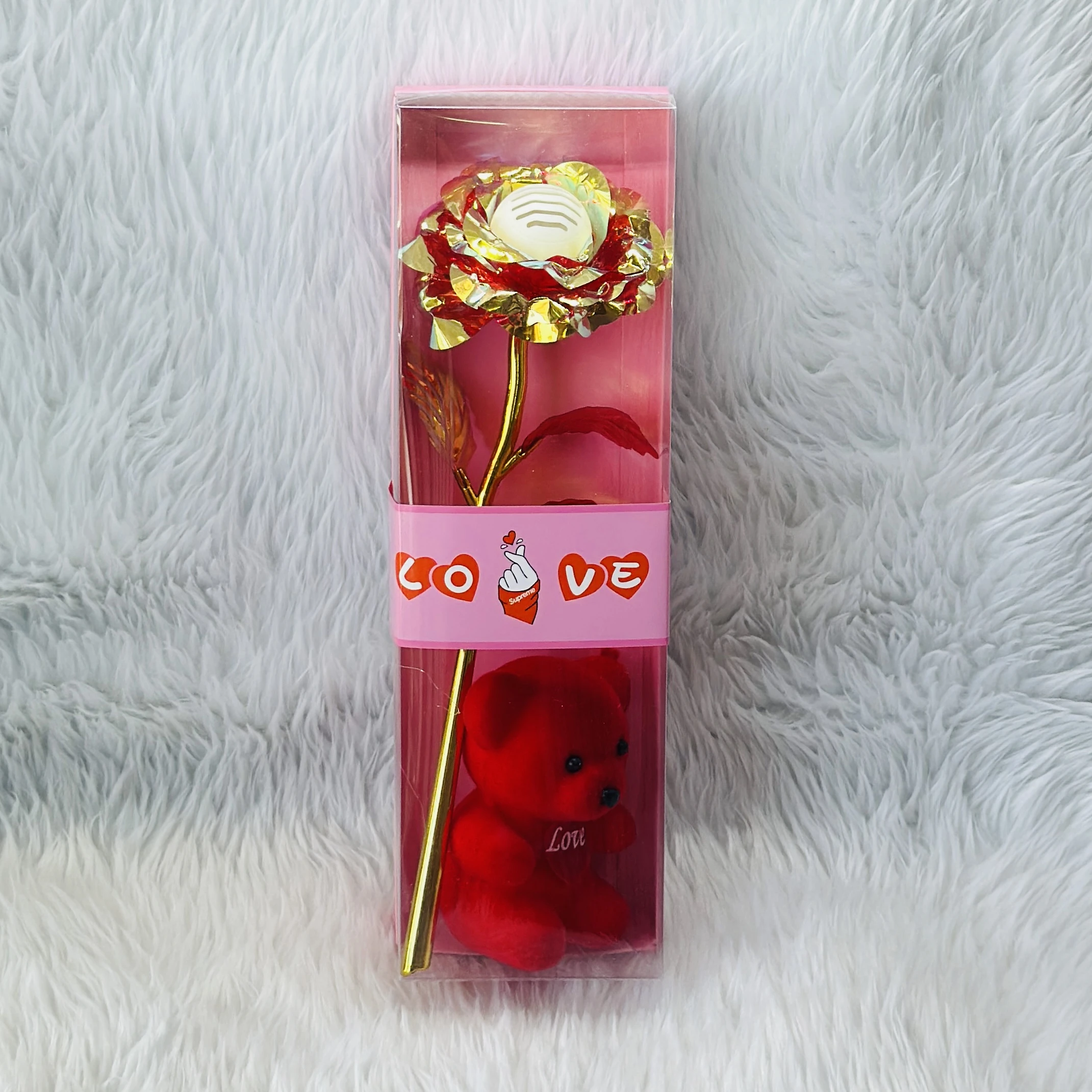 Gift set featuring an artificial golden rose and a red teddy bear, often marketed for Valentine's Day.