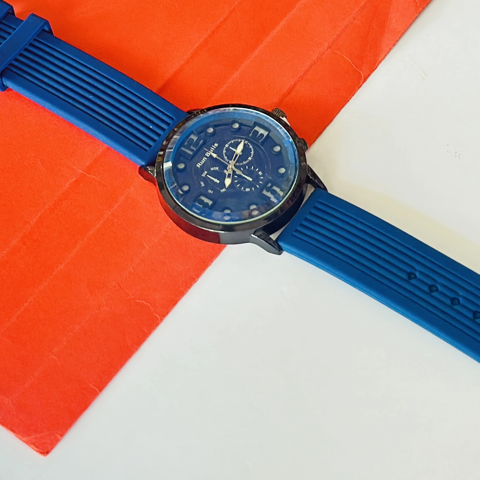watch appears to be a Run Bulls branded analog
