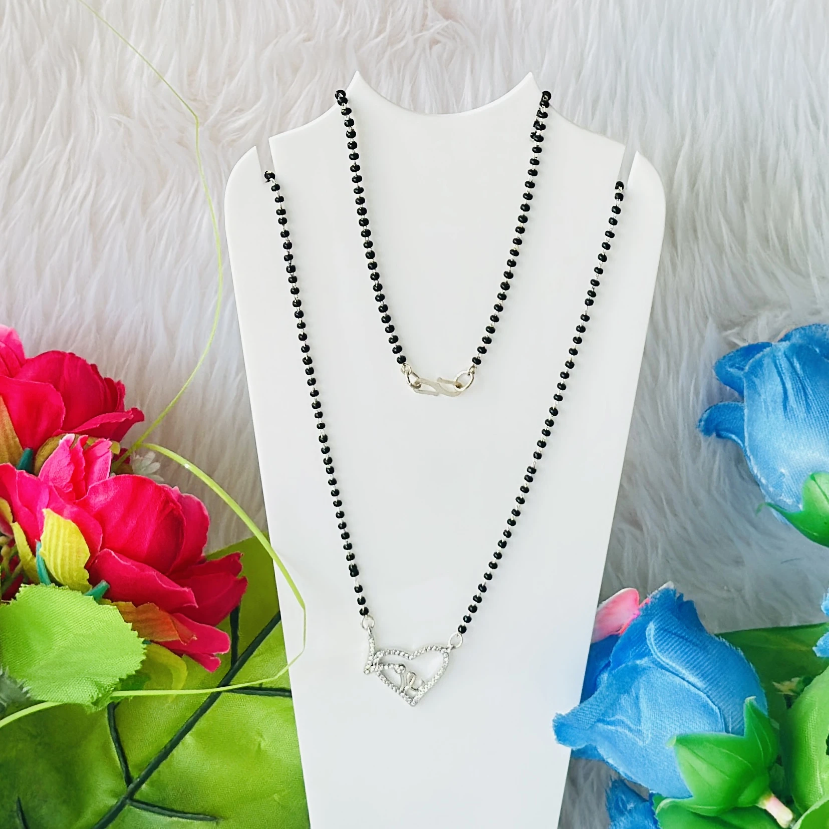 sterling silver rhodium-plated mangalsutra with a heart-shaped