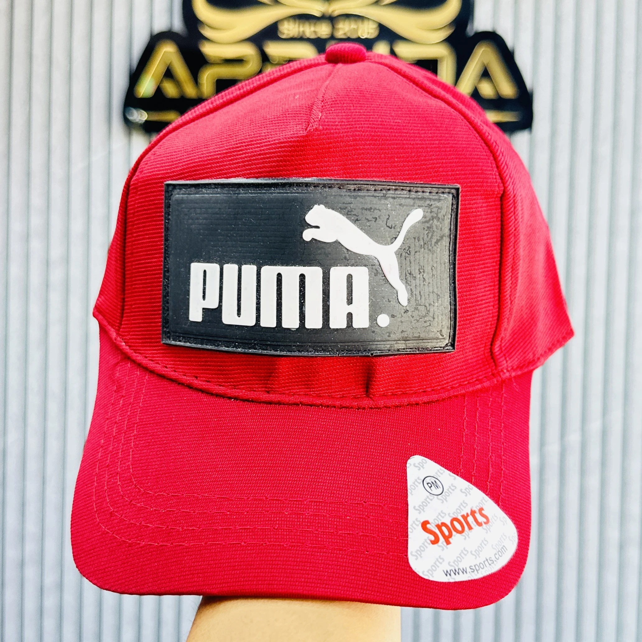 Red PUMA baseball cap,