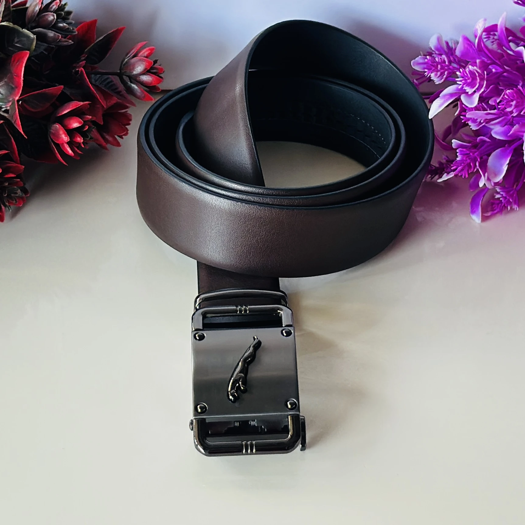 Black leather ratchet belt