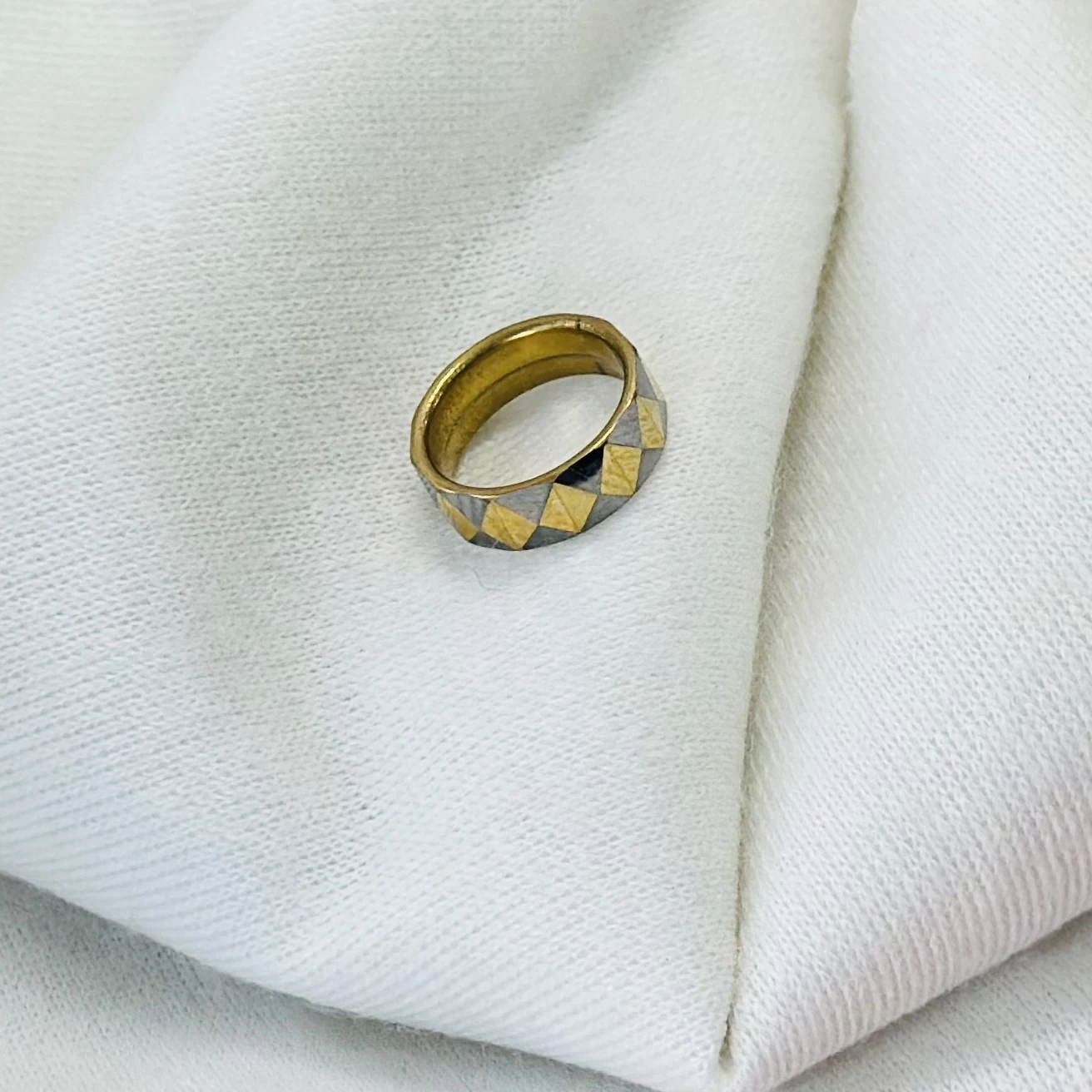 Tungsten carbide yellow faceted domed pyramid pattern wedding band ring.