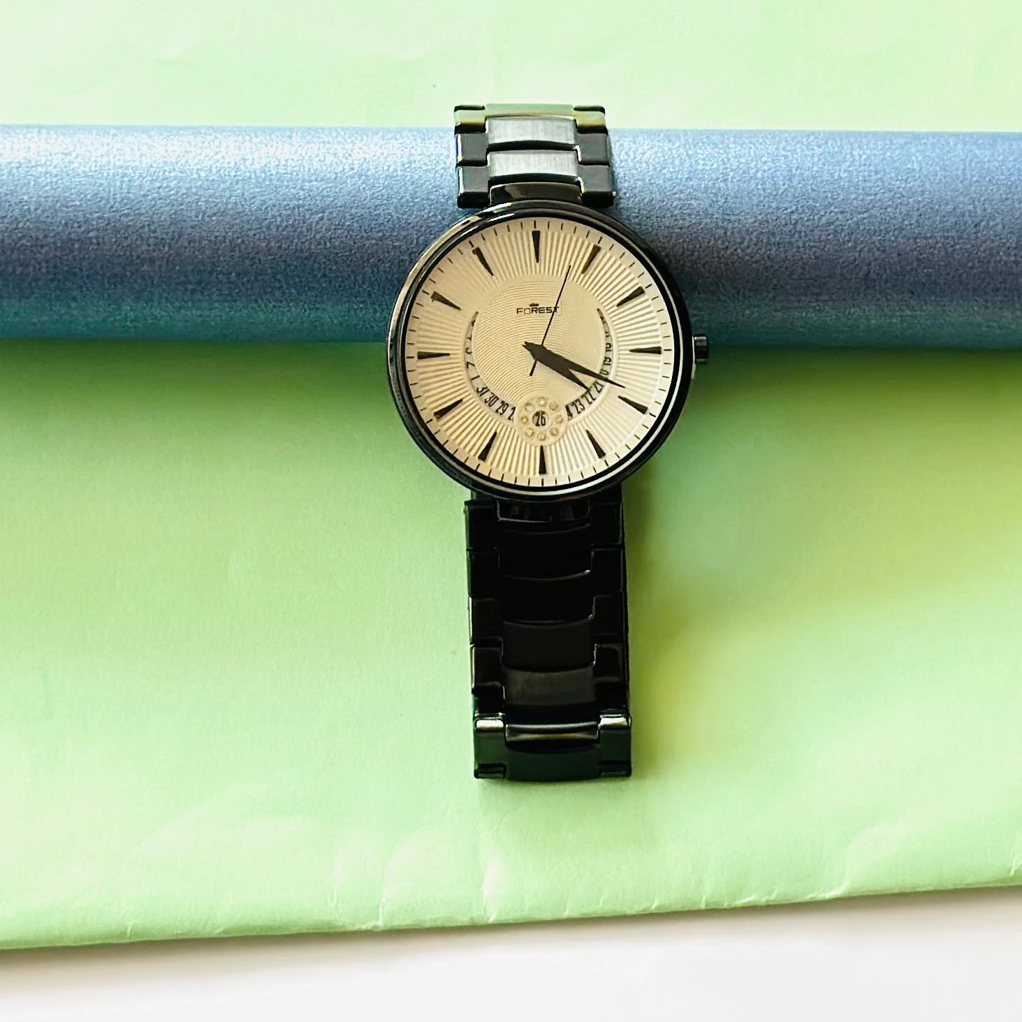 Forest Analog Watch for Men with a black metal strap.