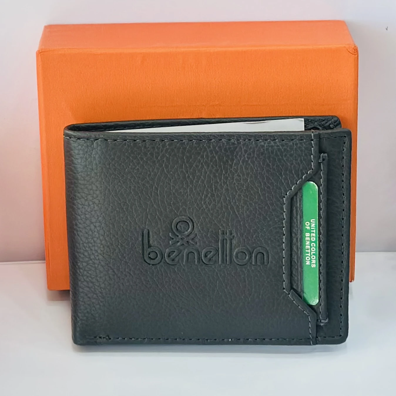 Black leather bi-fold wallet from United Colors of Benetton.