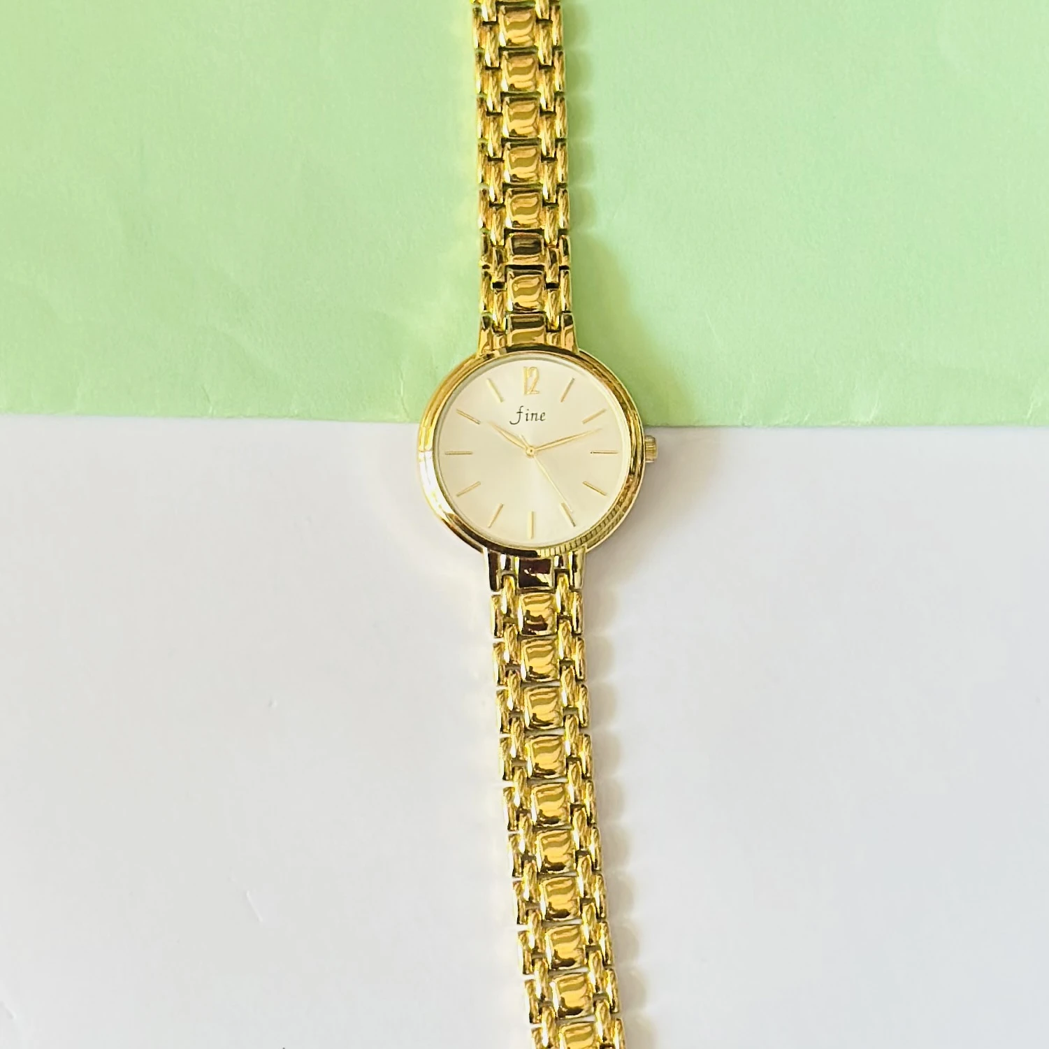 Gold tone women's analog watch