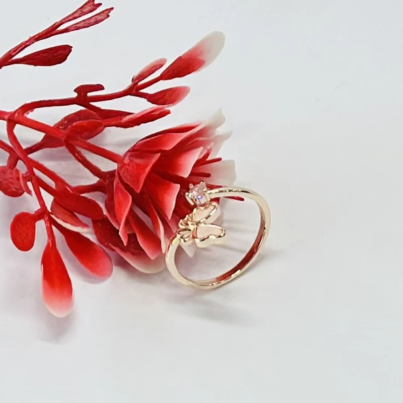 Rose gold-plated 925 sterling silver butterfly ring with a studded crystal.