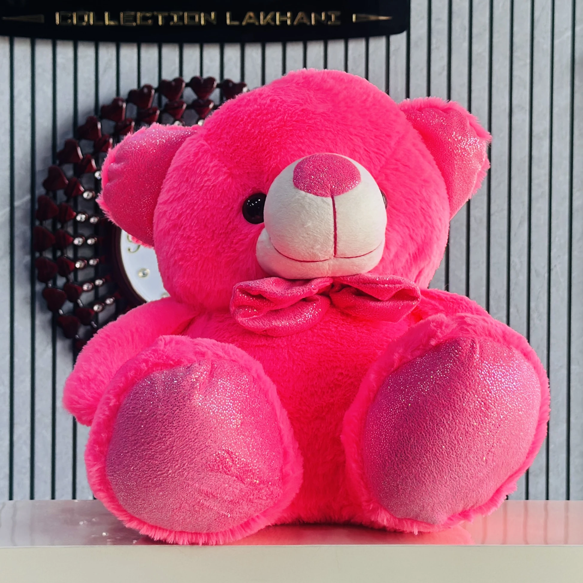 Bright pink plush teddy bear