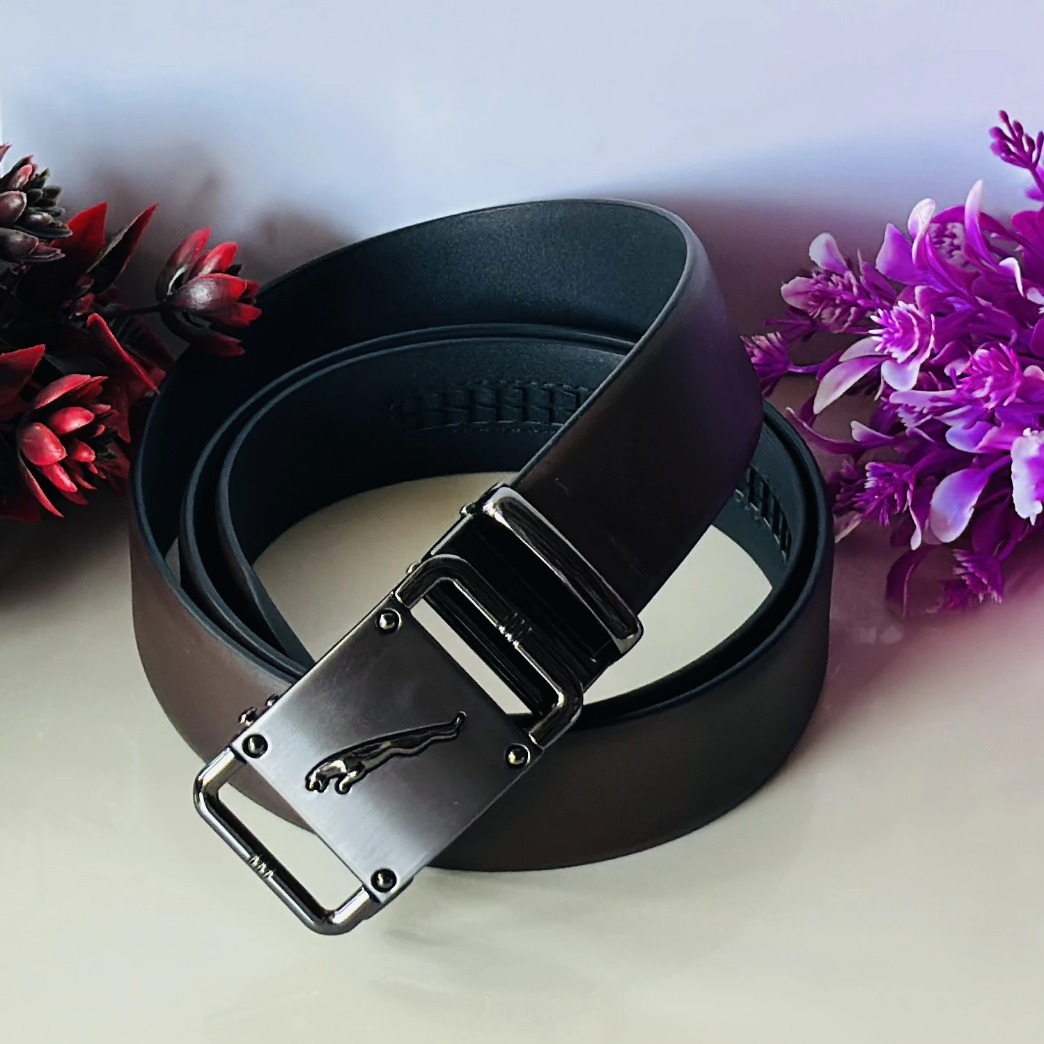 Black leather ratchet belt
