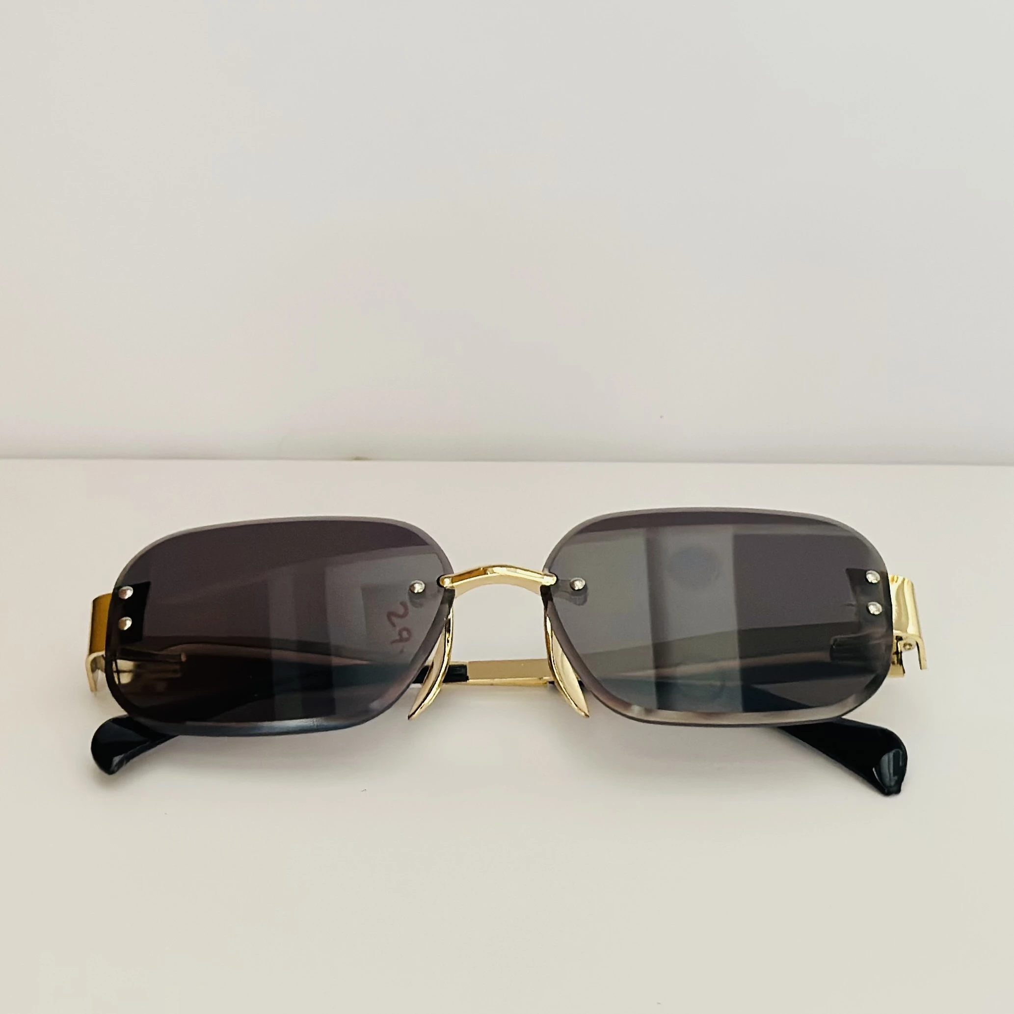 Cartier Santos de Cartier CT0460S rimless rectangular sunglasses