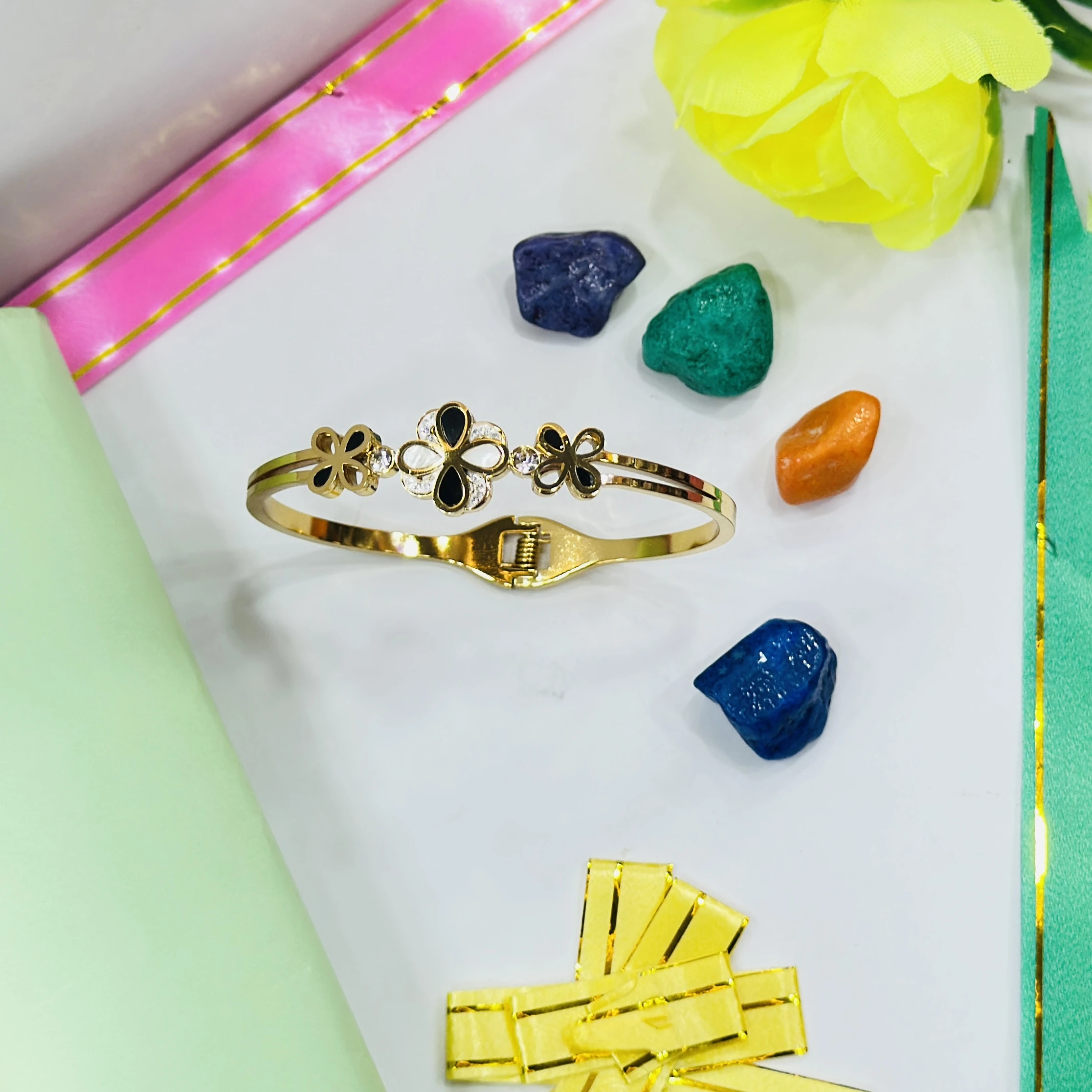 Gold plated stainless steel clover bangle